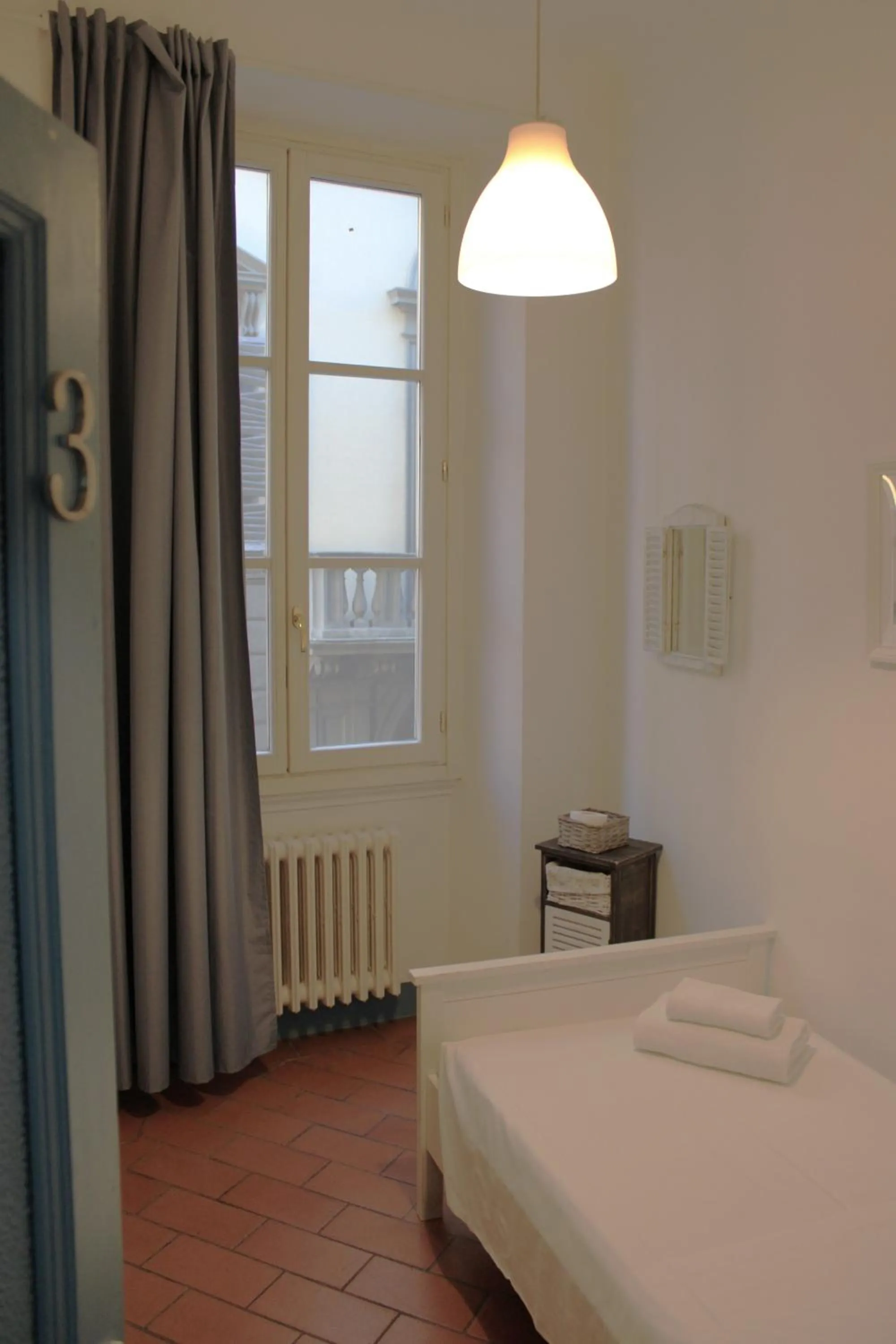 Bed in Michelangelo's Relais