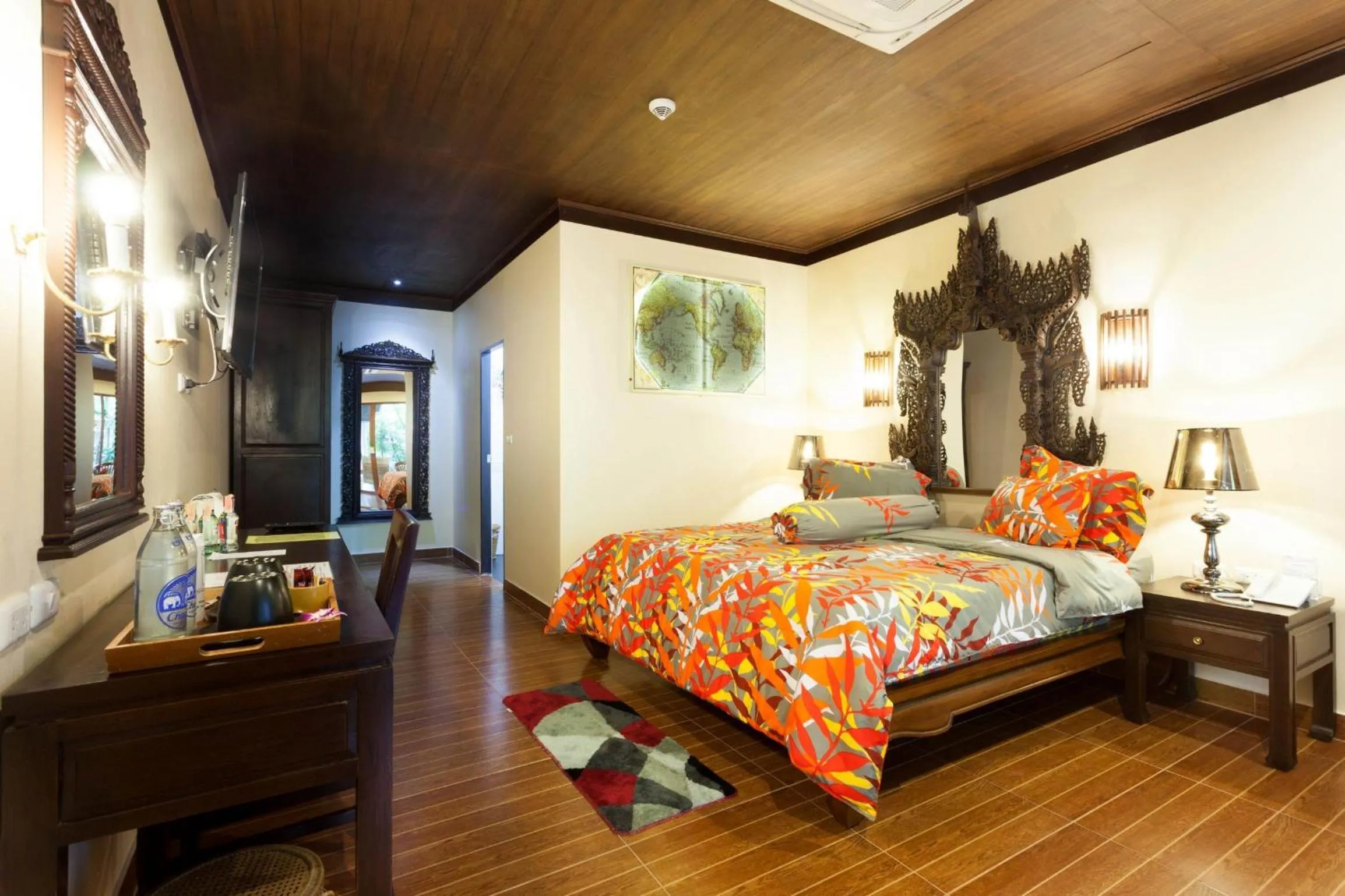 Bed in Tropica Bungalow Beach Hotel