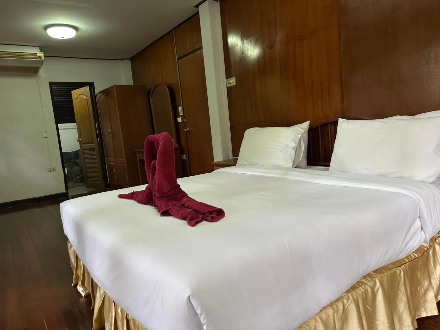 Bed in The Legacy River Kwai Resort