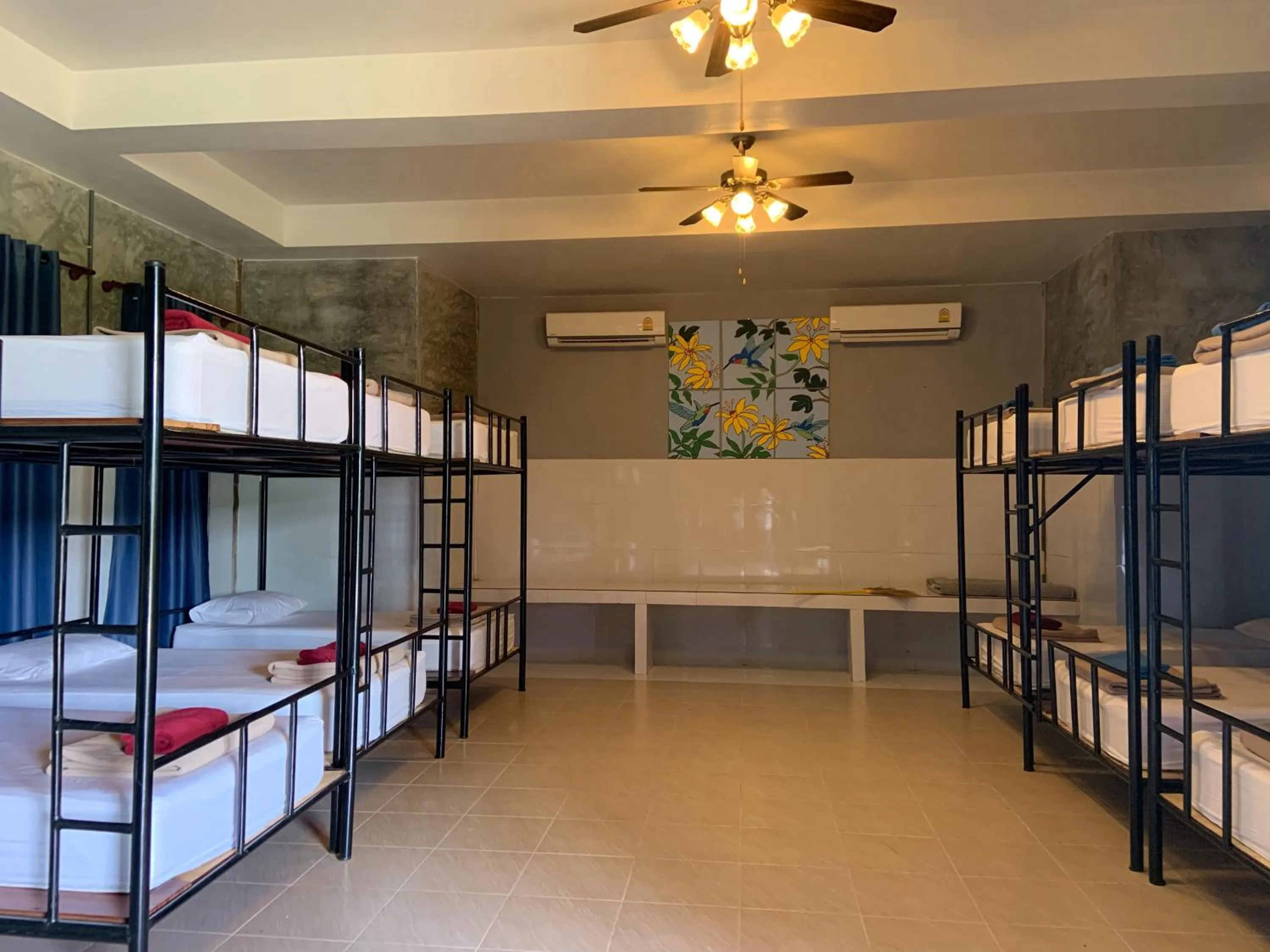 Bed in Boutique Raft Resort, River Kwai