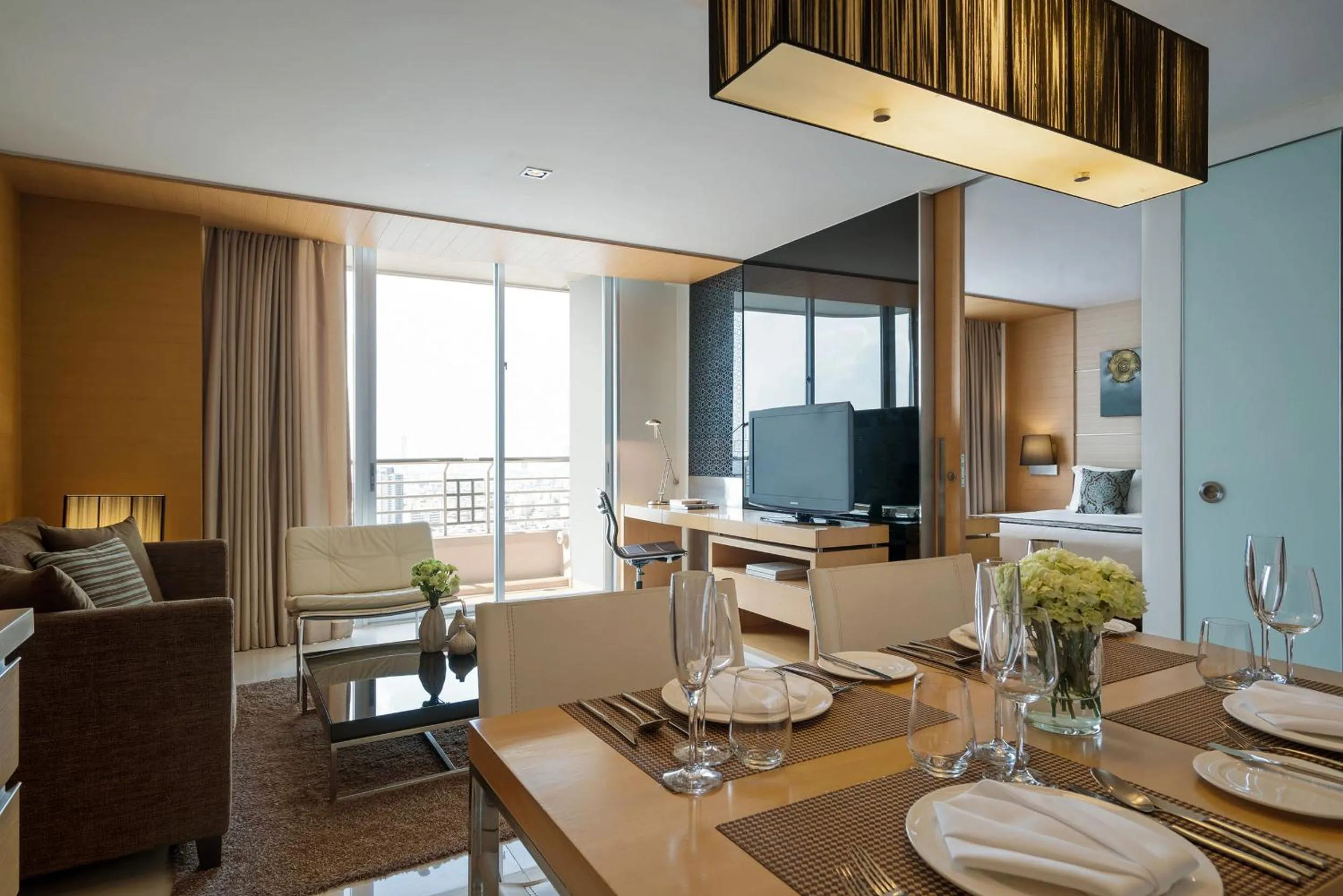 Skyline One-Bedroom Suite with Private Balcony in JC Kevin Sathorn Bangkok Hotel