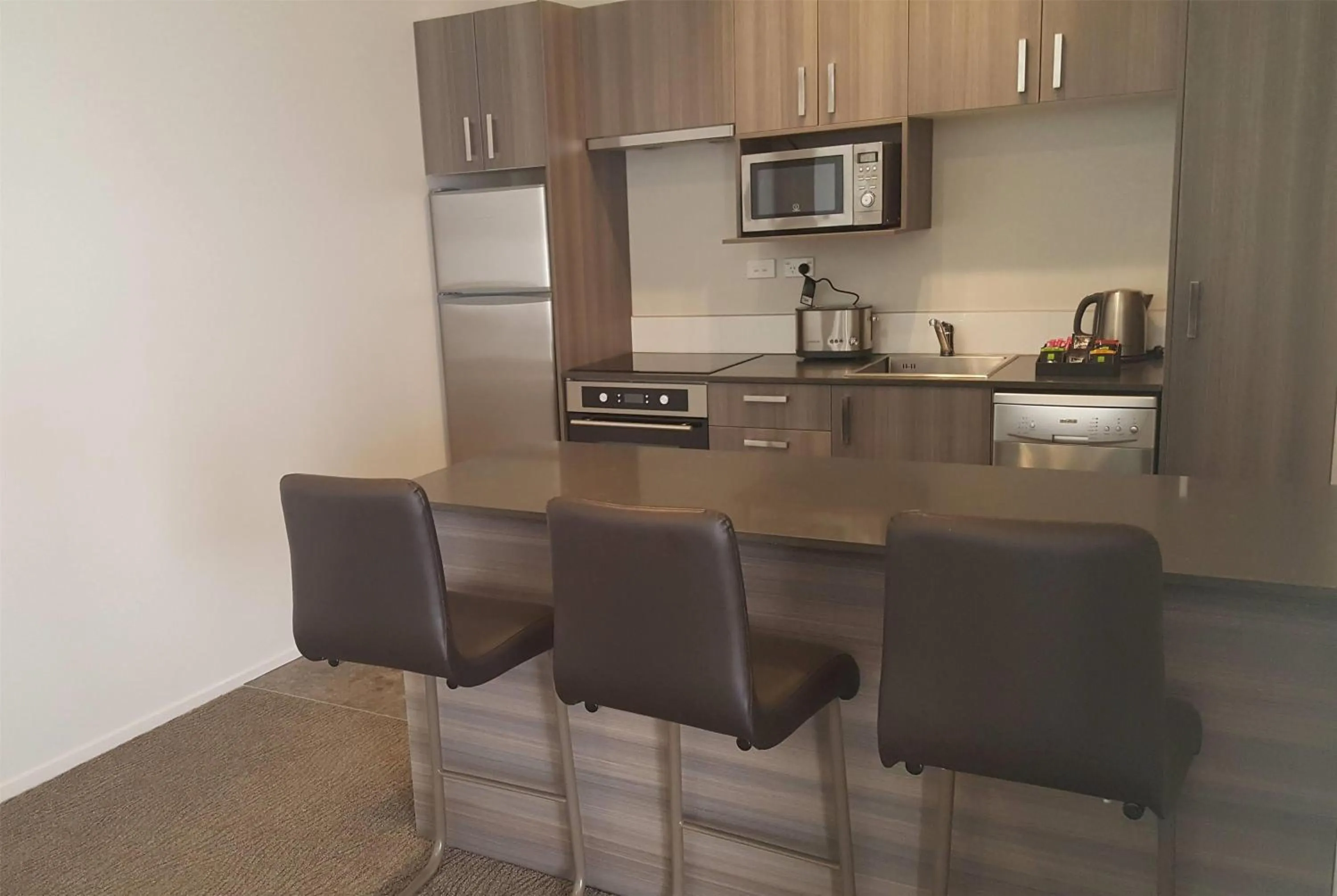 Photo of the whole room in Ramada Suites by Wyndham Queenstown Remarkables Park