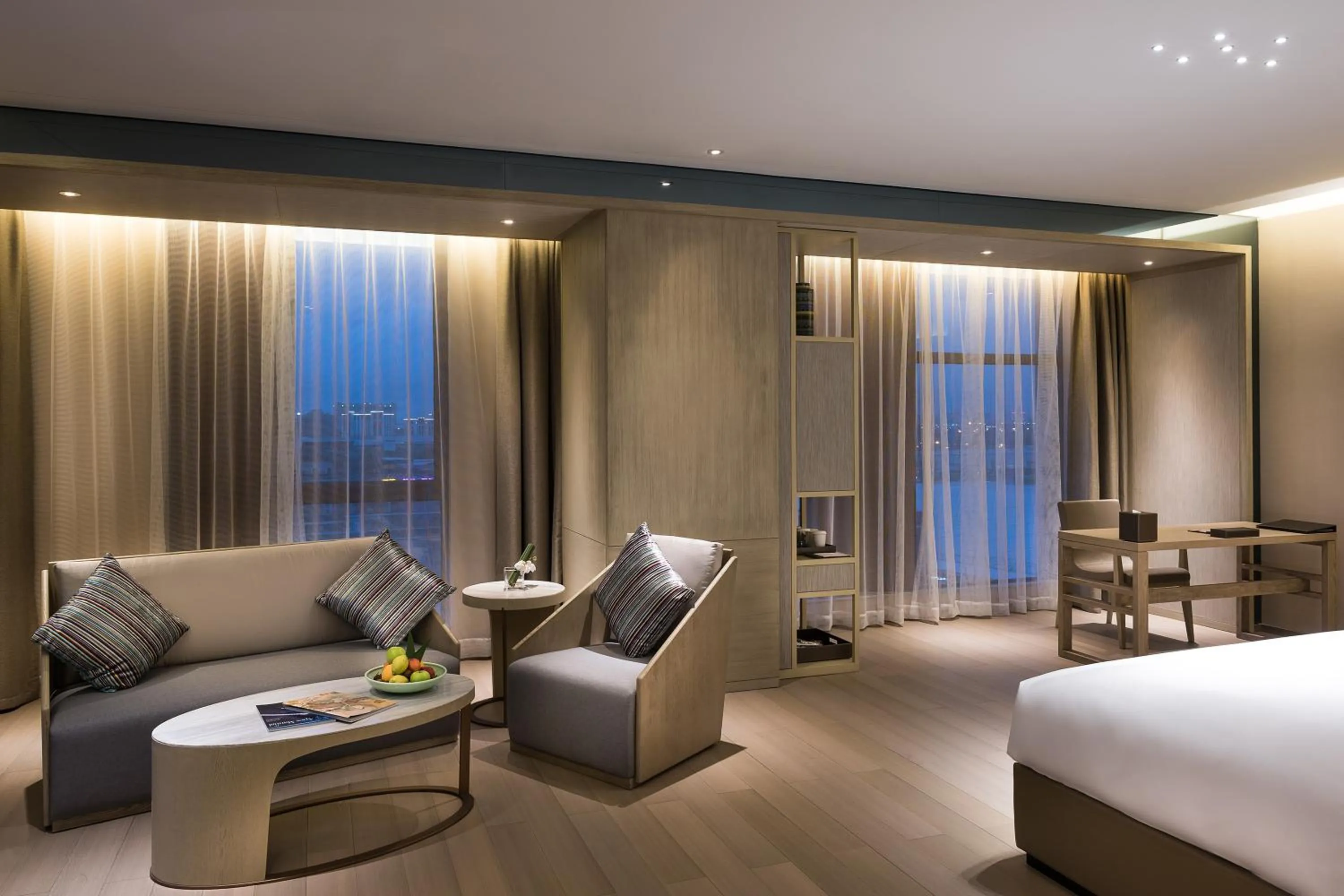 Living room, Bed in Novotel Shanghai Clover