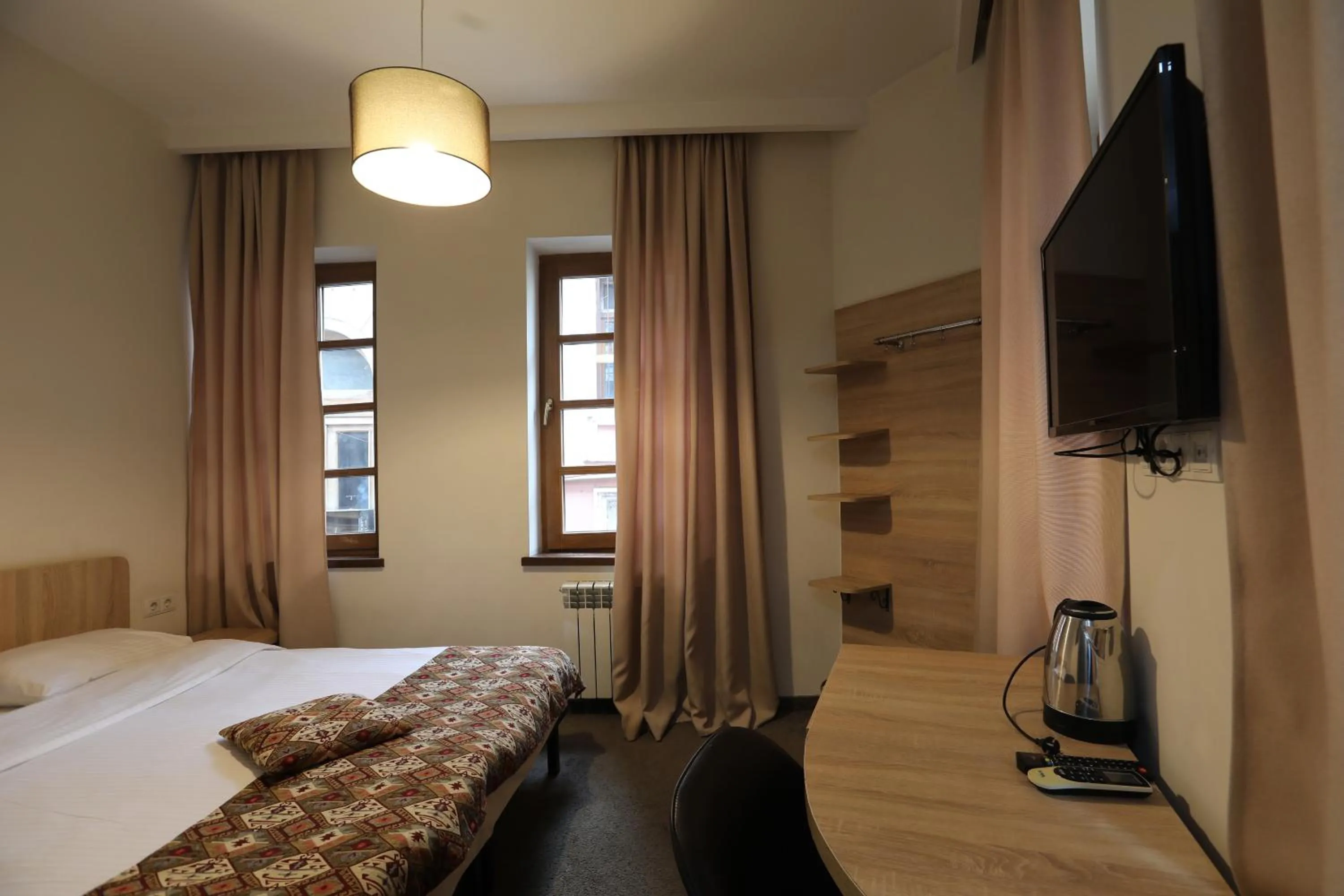 Bed in Tekla Palace By Urban Hotels