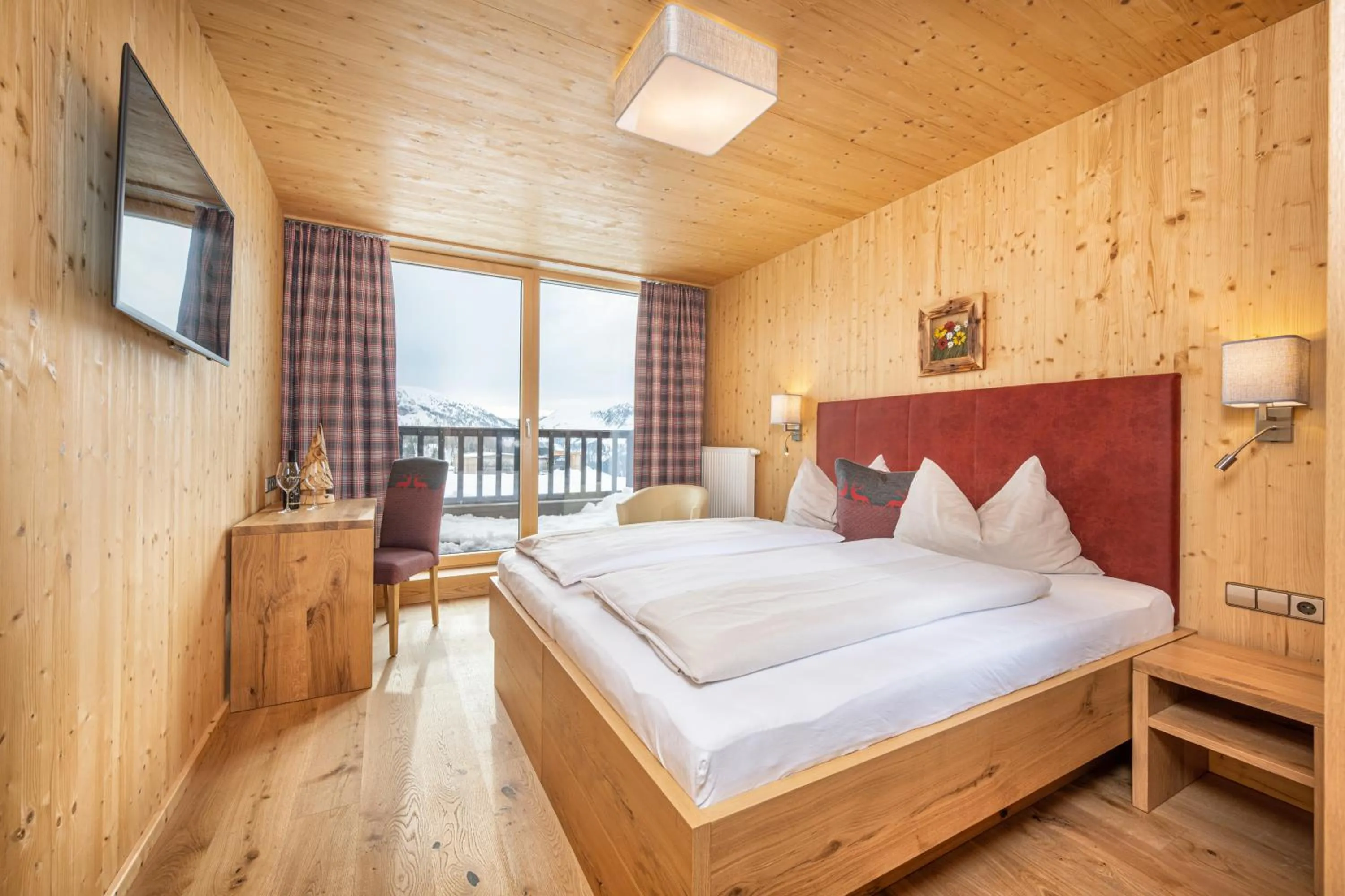 Bedroom, Bed in Hotel Almschlössl & Schrotteralm