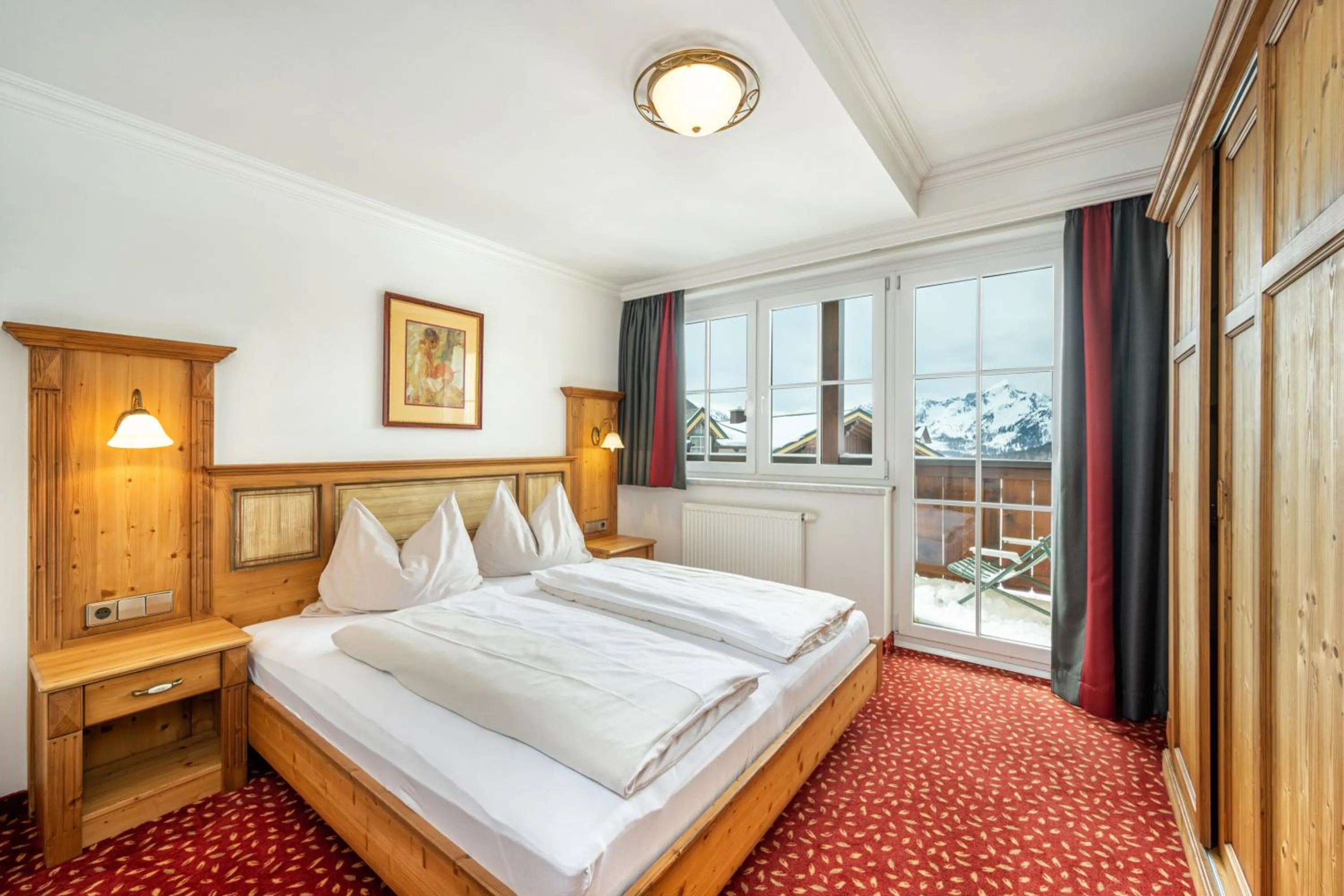 Bedroom, Bed in Hotel Almschlössl & Schrotteralm