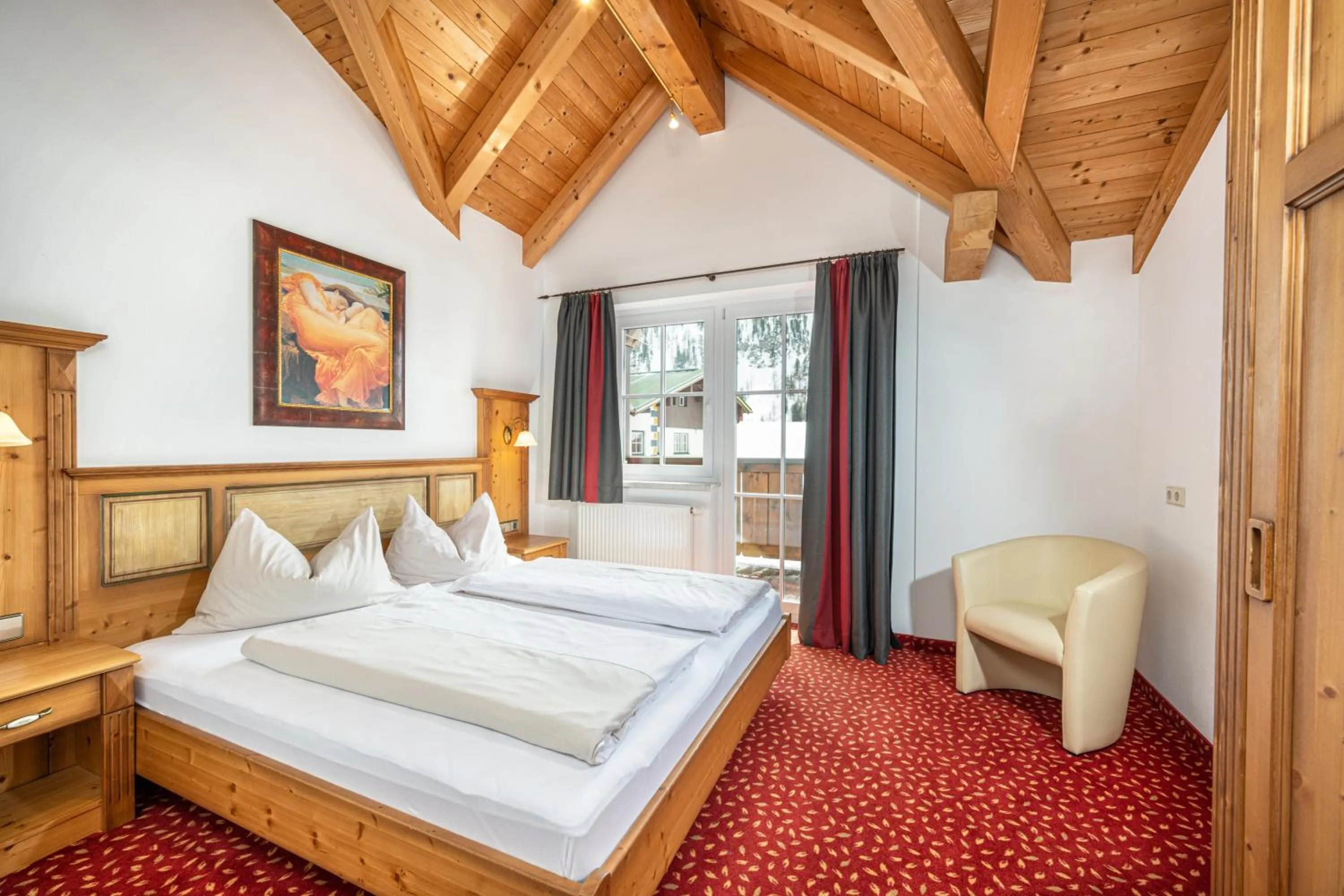 Bedroom, Bed in Hotel Almschlössl & Schrotteralm