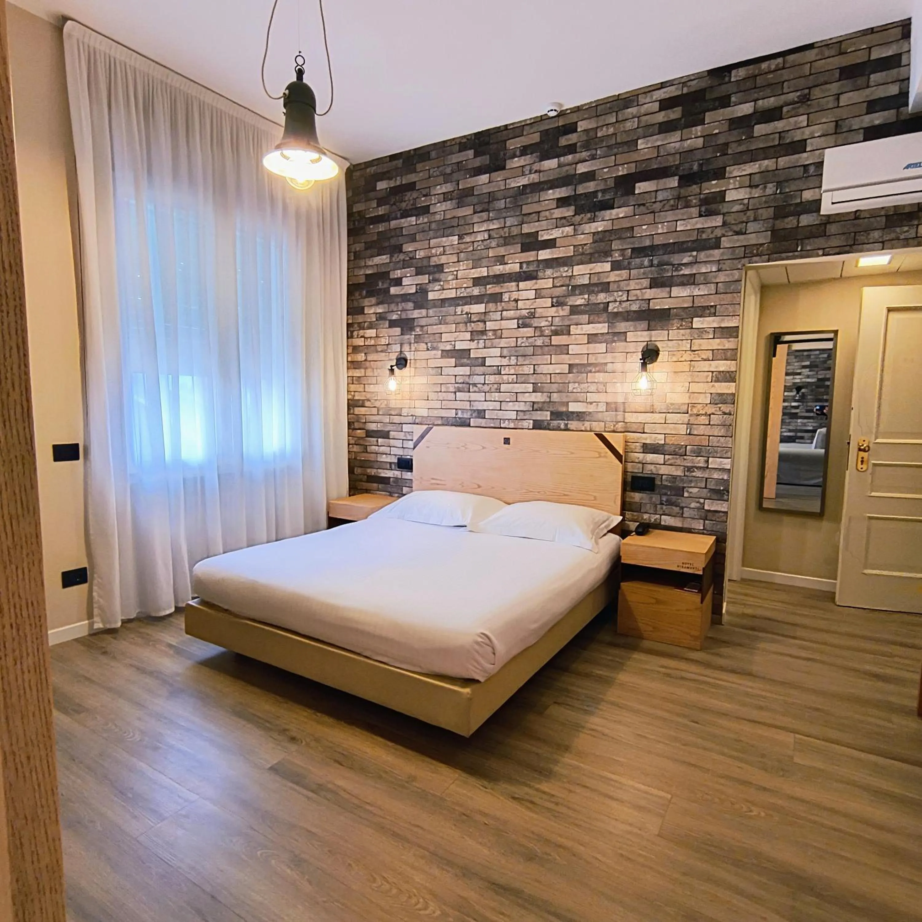 Bed in Hotel Miramonti