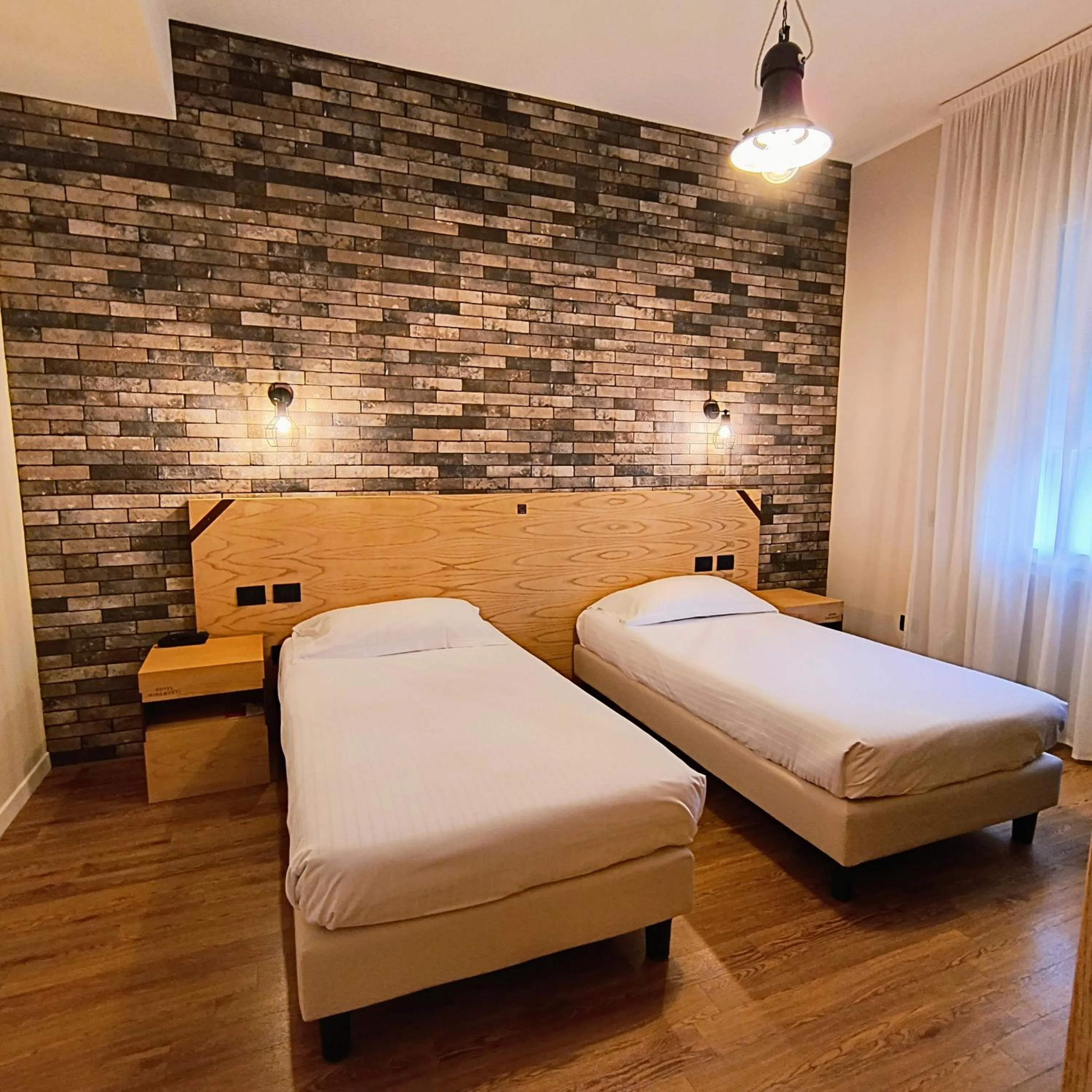 Bed in Hotel Miramonti