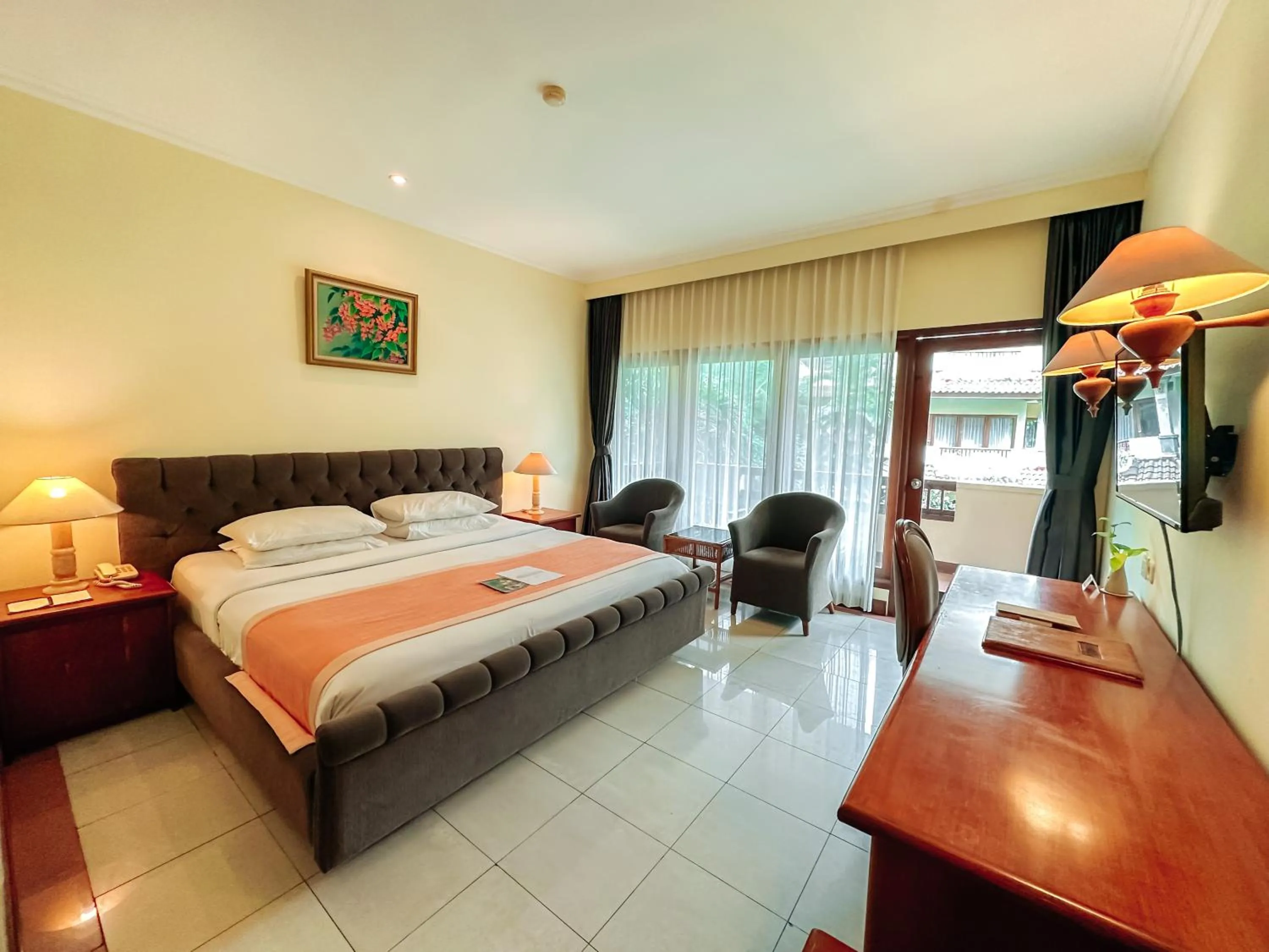 Bed in Parigata Resorts and Spa