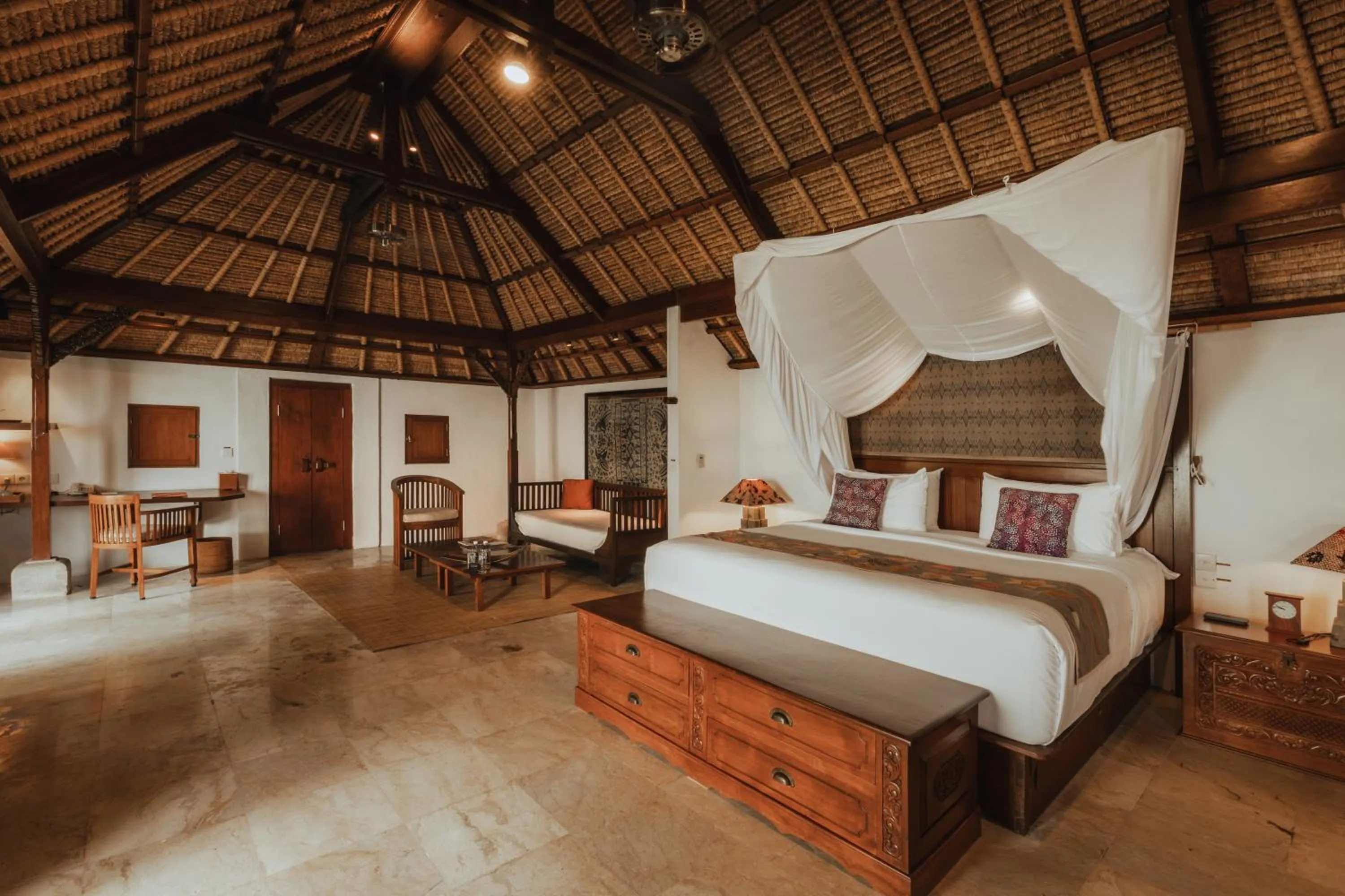 Bed in Jimbaran Puri, A Belmond Hotel, Bali