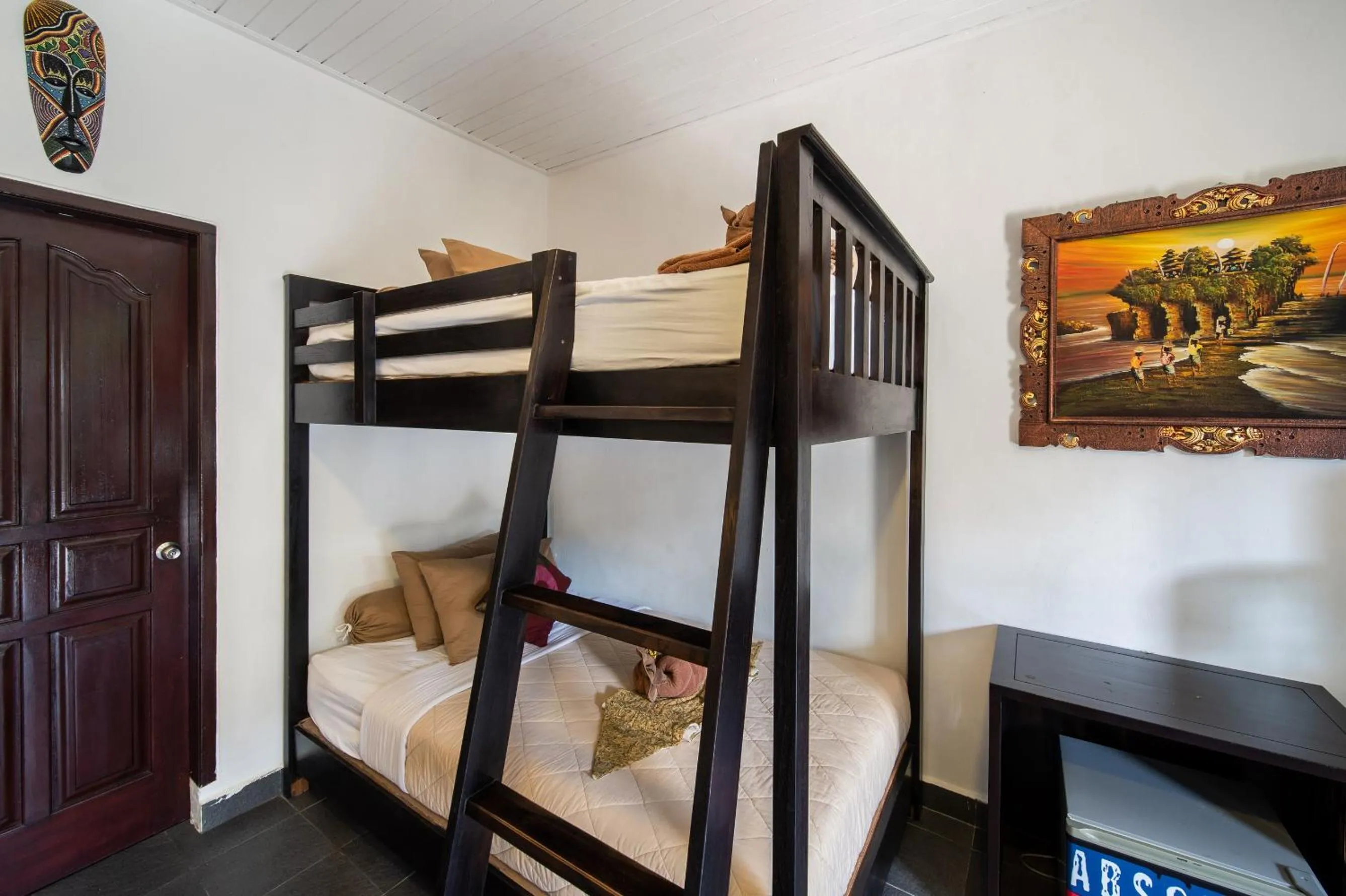 Bed in Absolute Scuba Bali Dive Resort