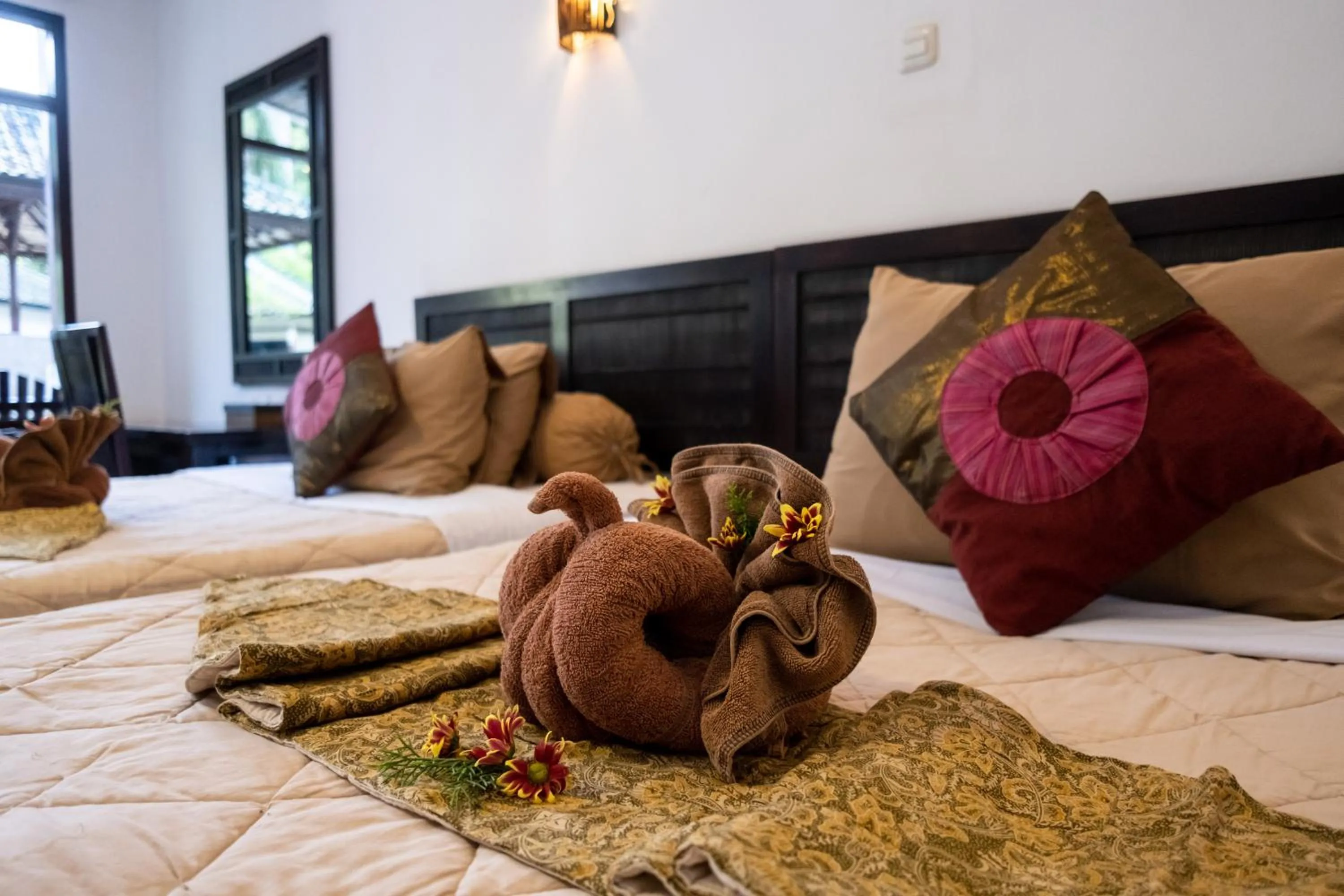 Bed in Absolute Scuba Bali Dive Resort