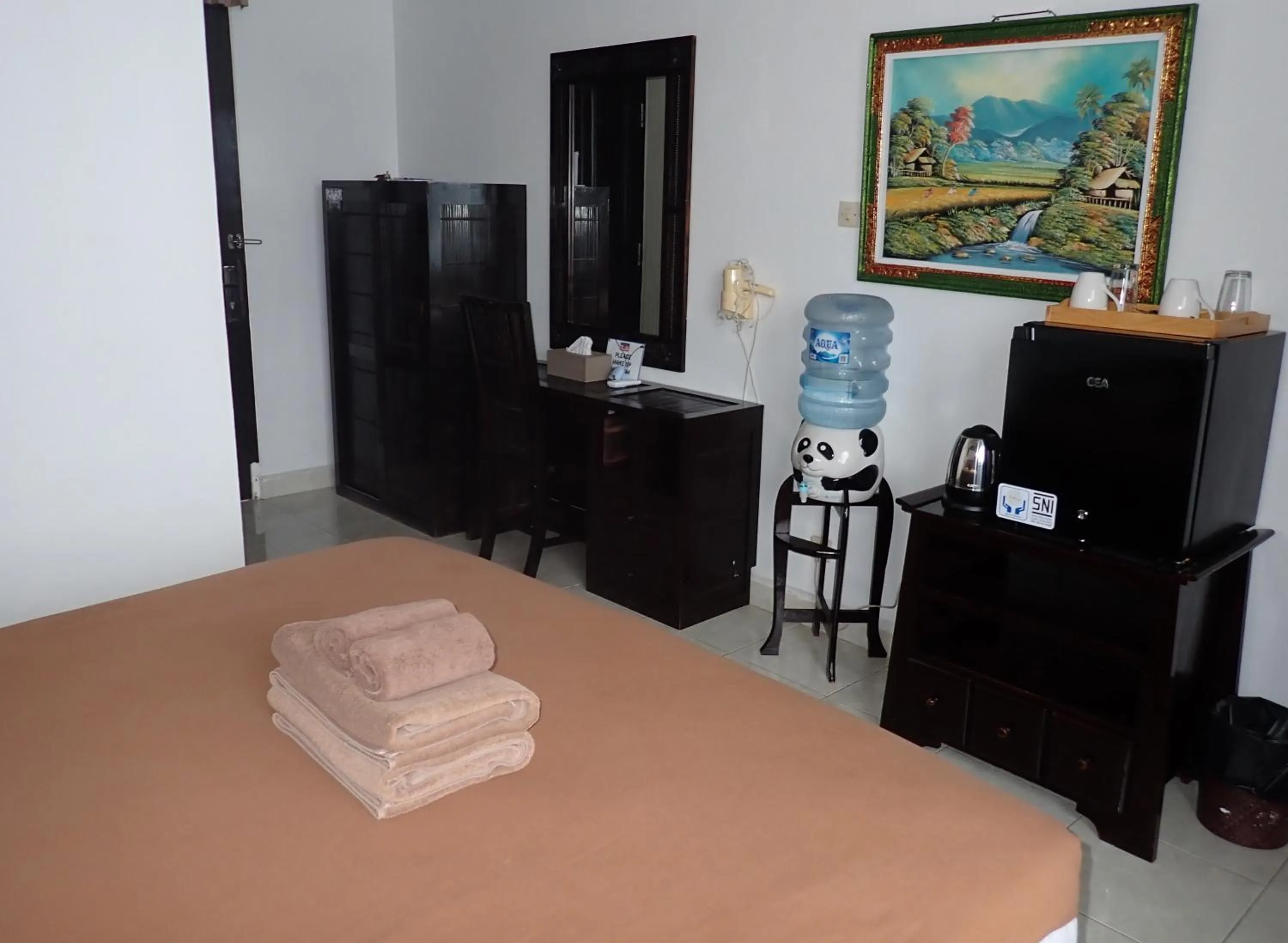 Bed in Absolute Scuba Bali Dive Resort