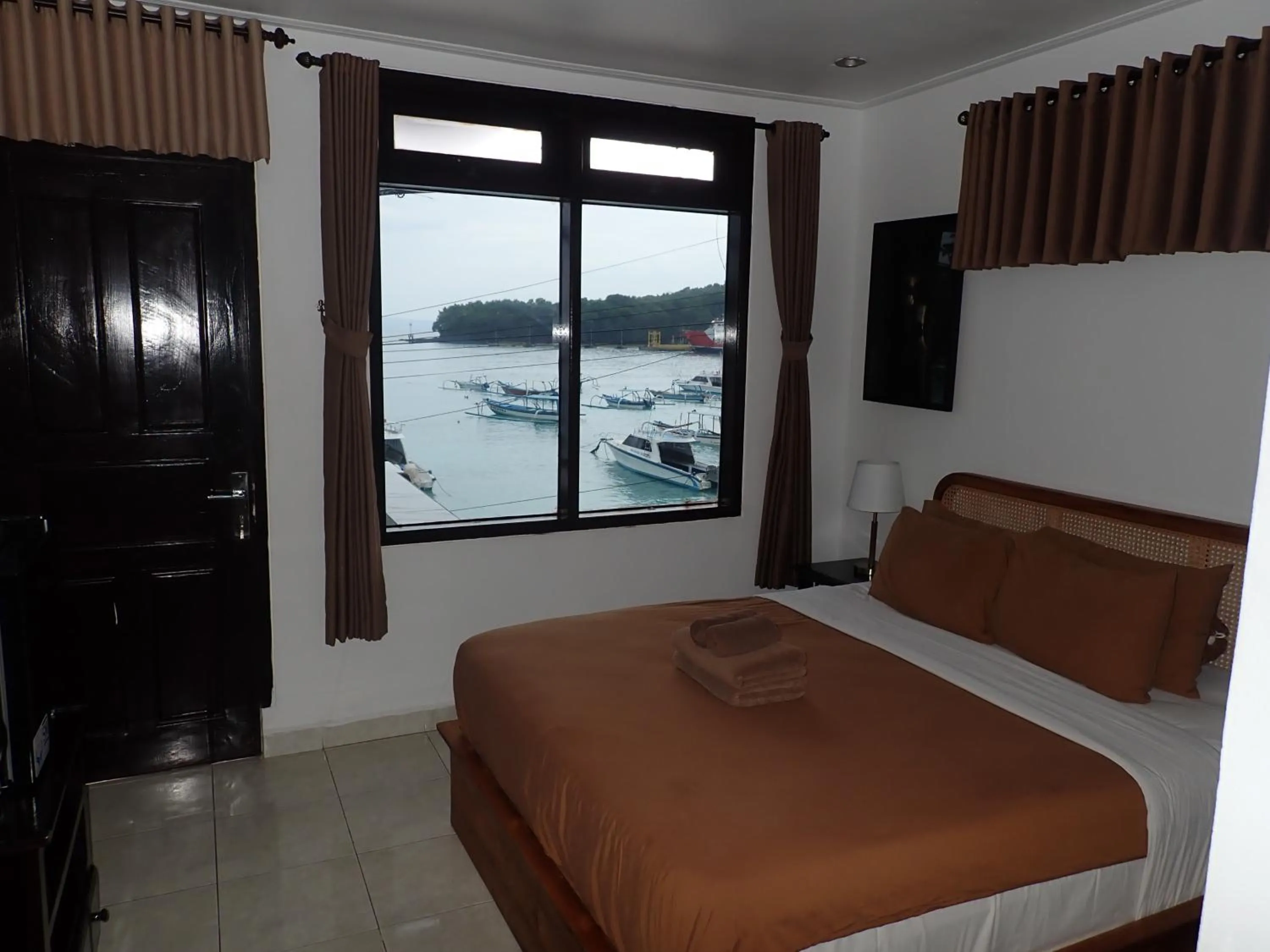 Bed in Absolute Scuba Bali Dive Resort