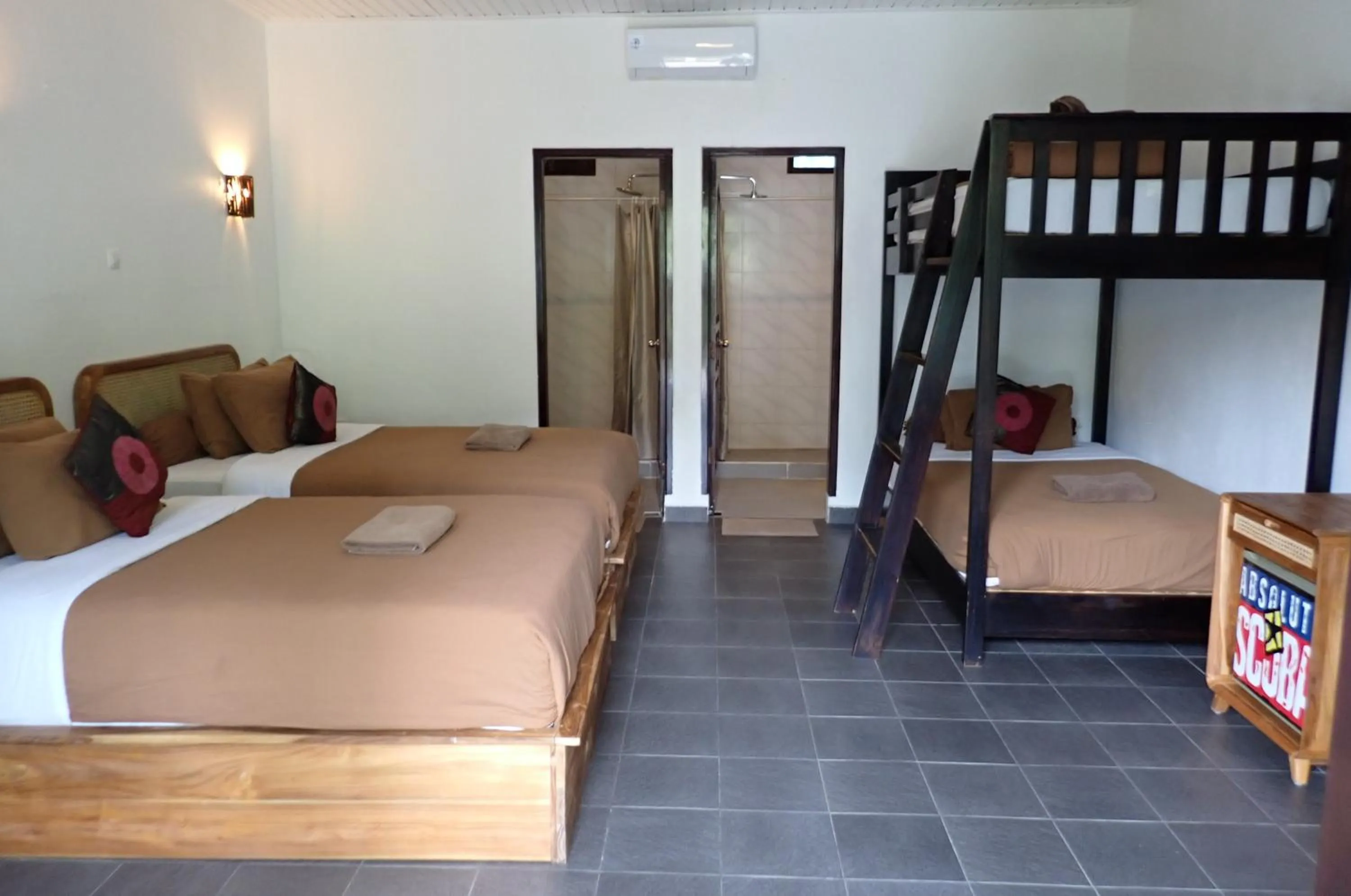 Bed in Absolute Scuba Bali Dive Resort