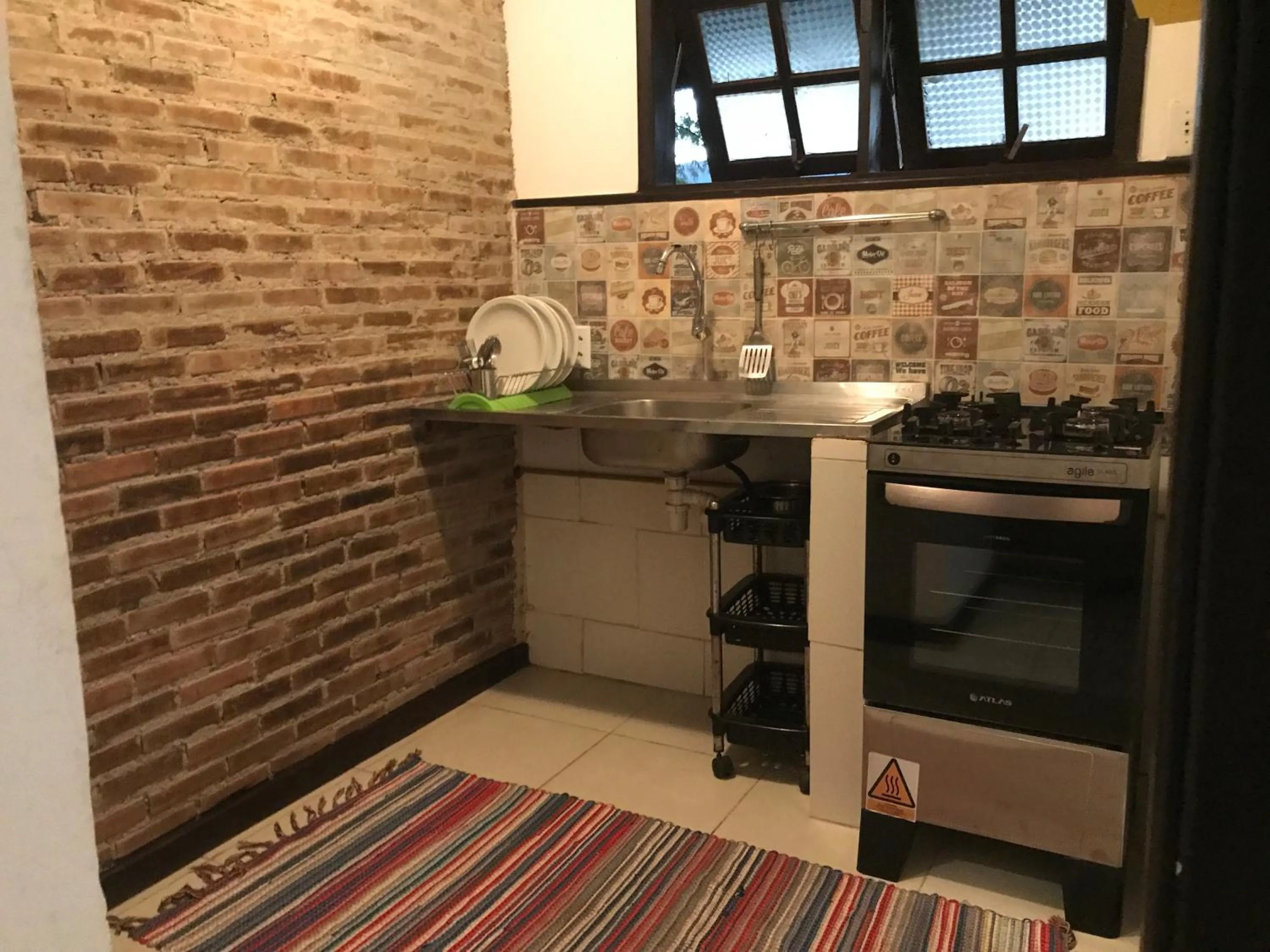 Kitchen or kitchenette in Praia Comprida Flats
