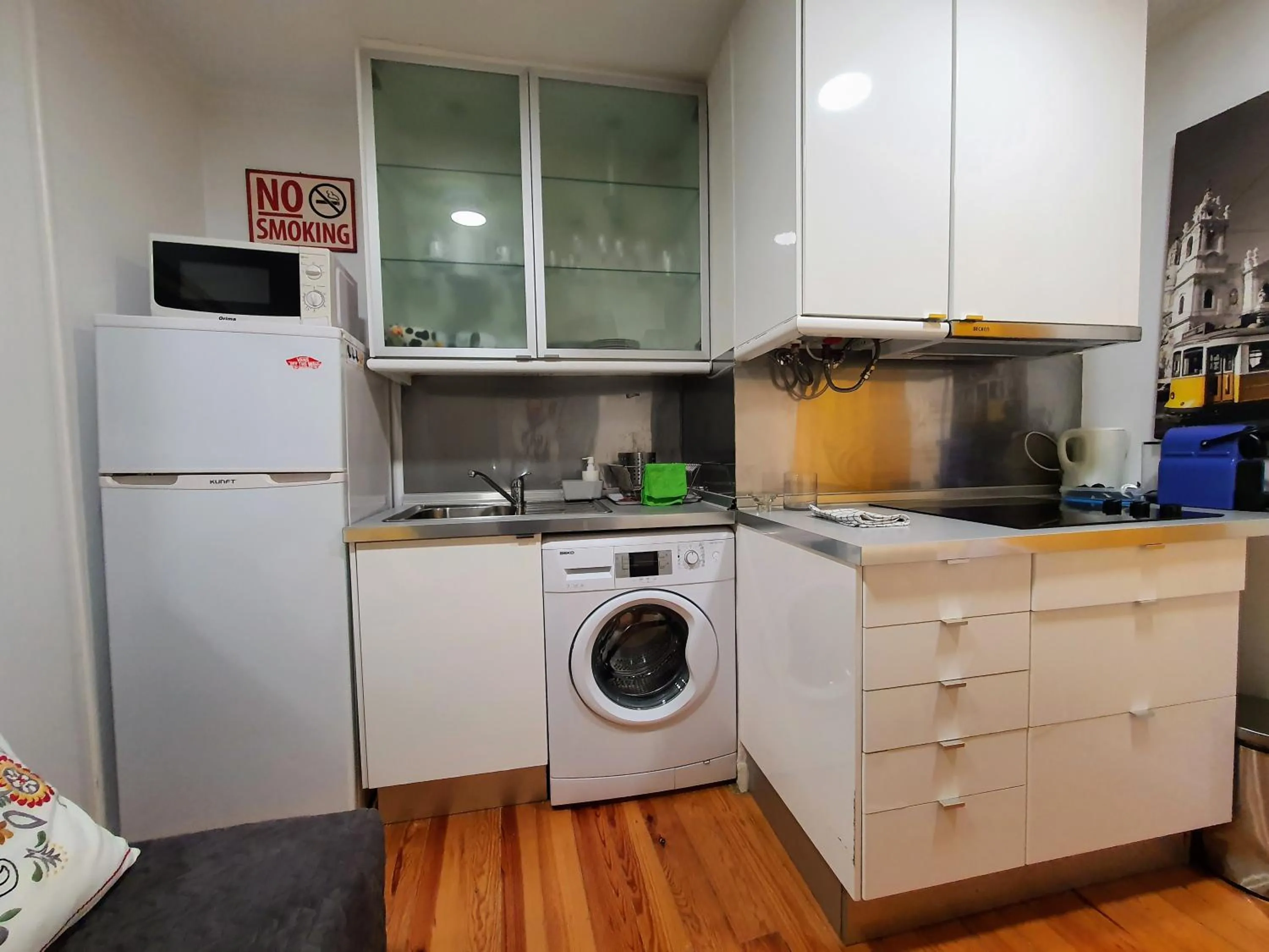 Kitchen or kitchenette in Casa do Garcês by Lisbon Village Apartments