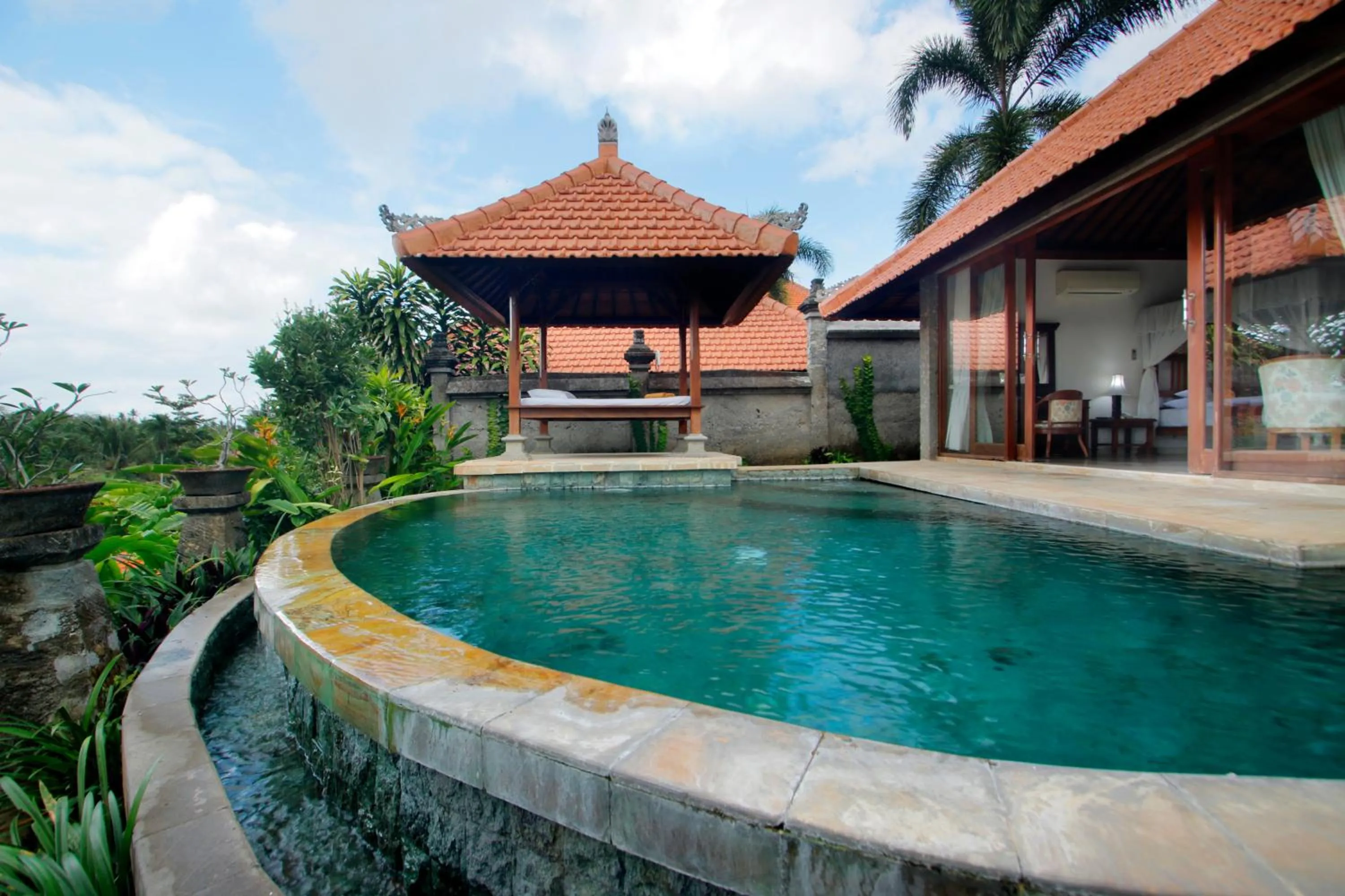 Swimming pool in Santi Mandala Villa & Spa
