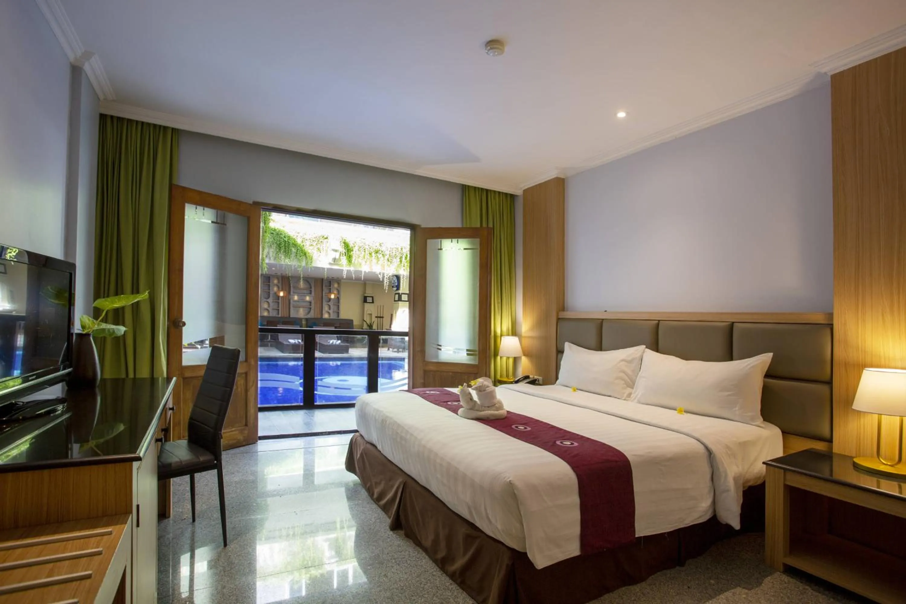 Bed in Famous Hotel Kuta Formerly Permata Kuta Hotel