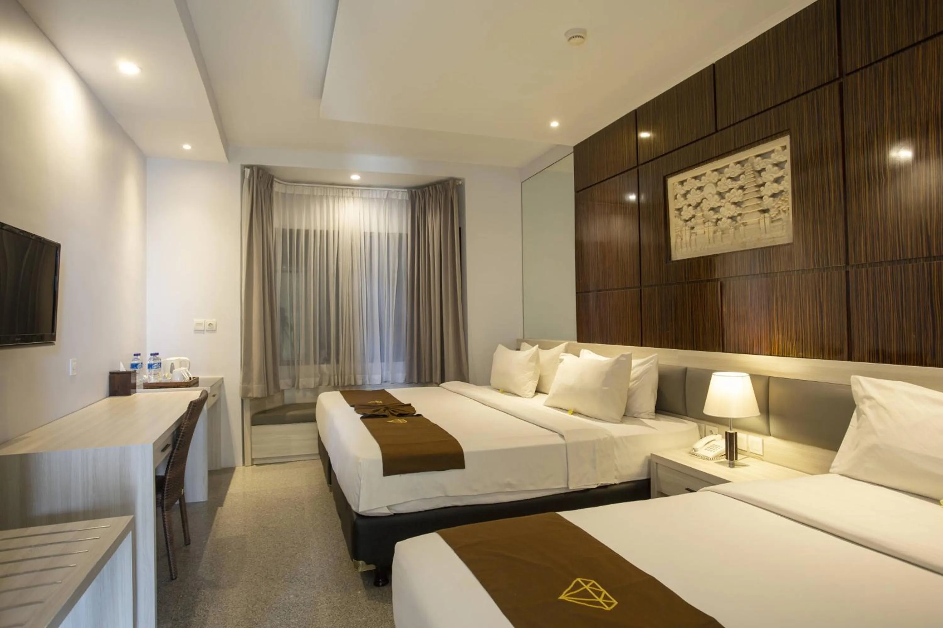 Bed in Famous Hotel Kuta Formerly Permata Kuta Hotel