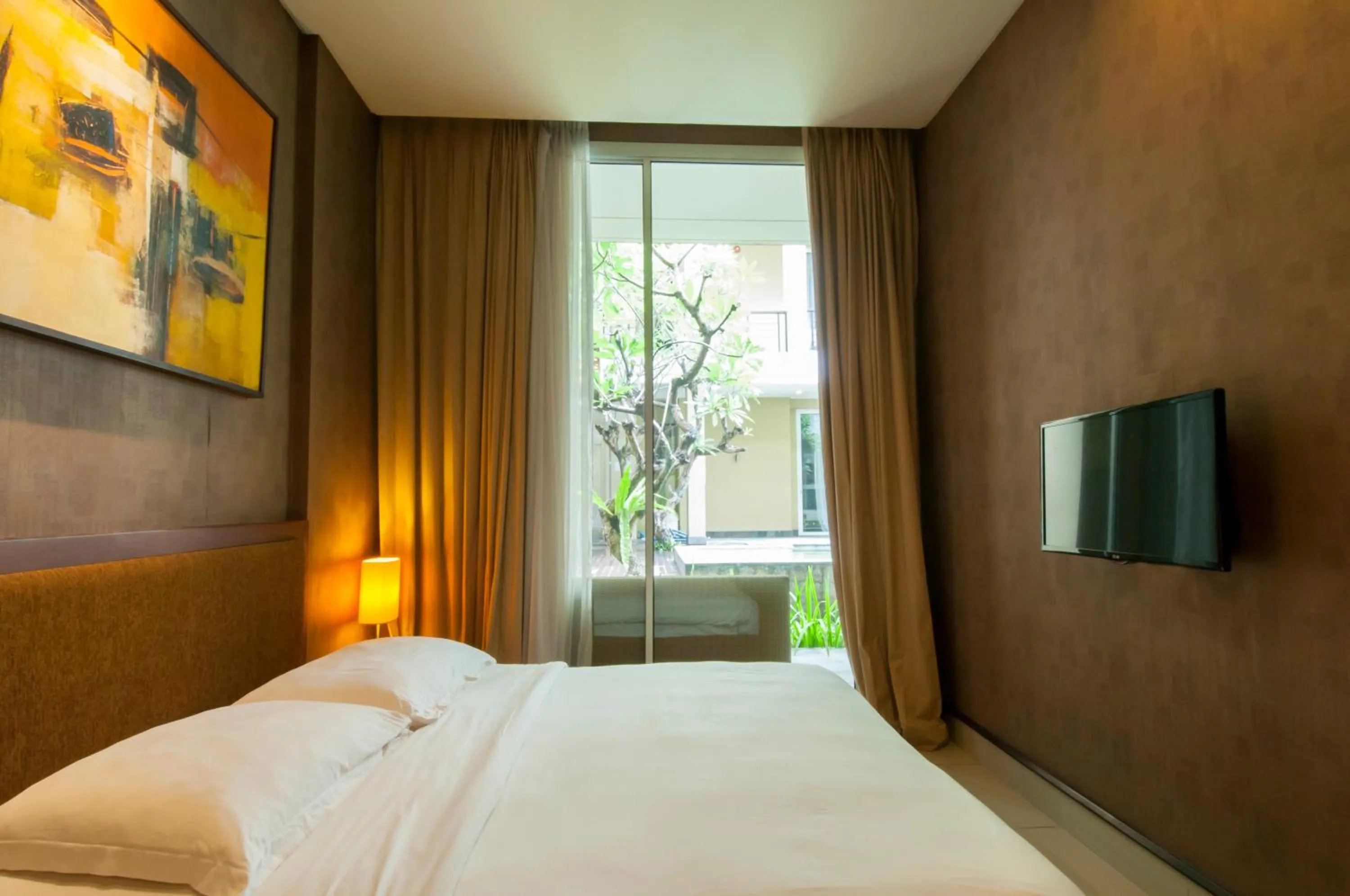 Bedroom, TV/Entertainment Center in 100 Sunset Boutique