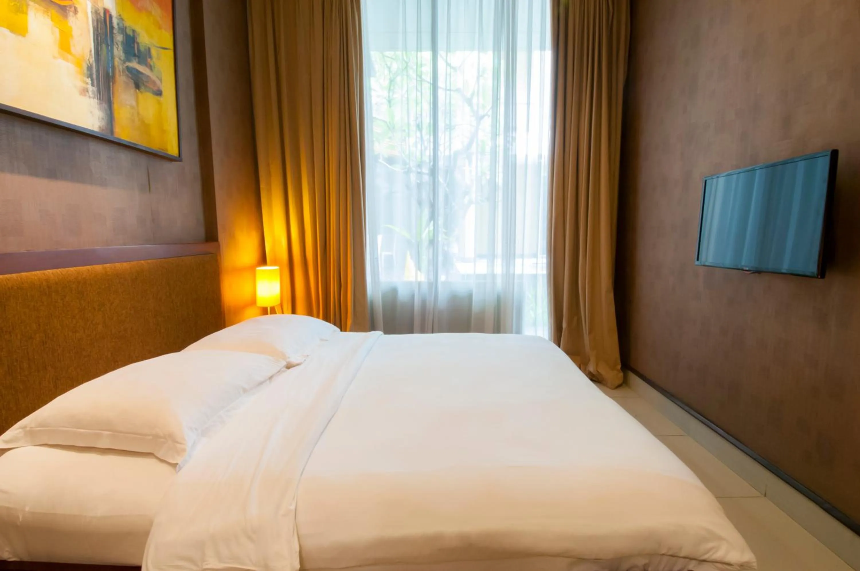 Bedroom in 100 Sunset Boutique