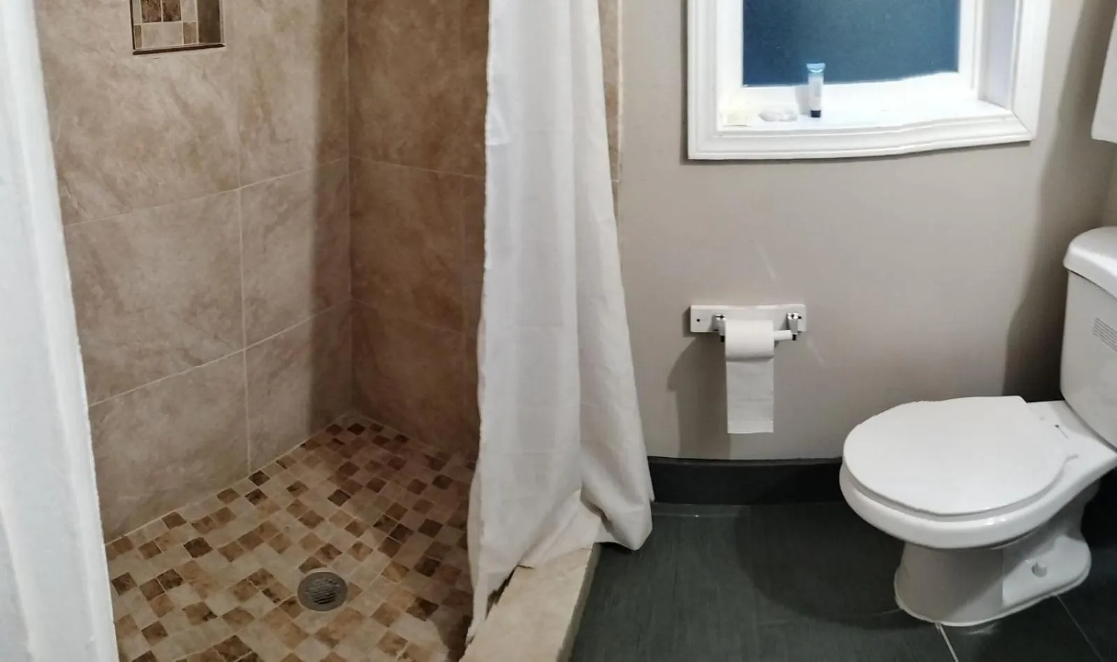 Bathroom in Budget Lodge by OYO Portland West