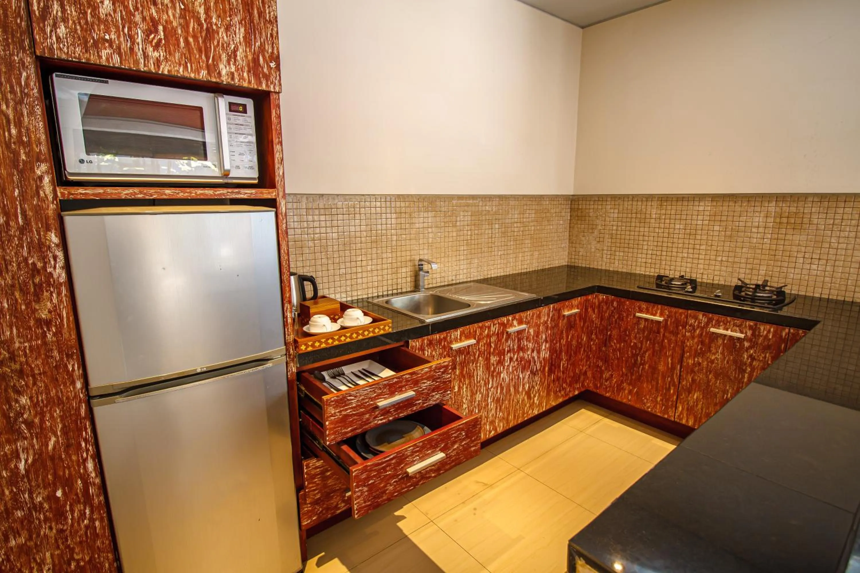 Kitchen or kitchenette in The Wolas Villas
