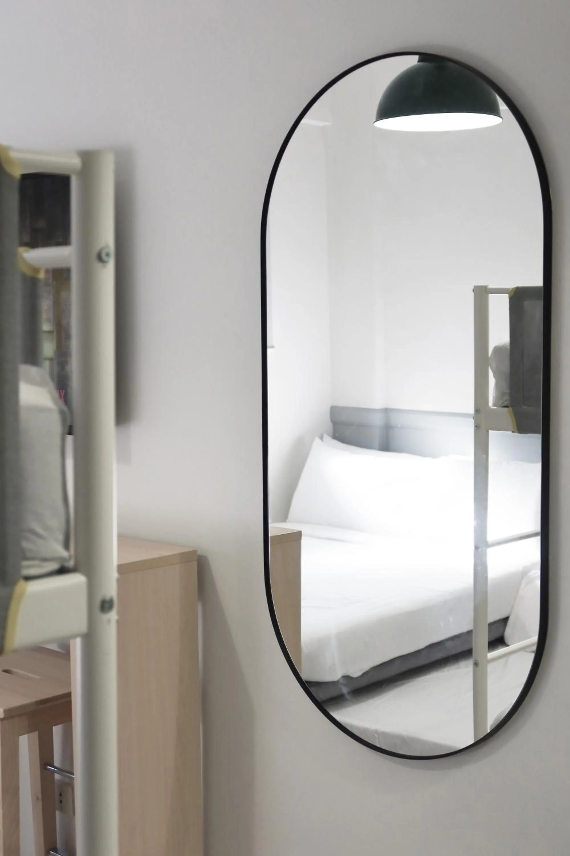 Decorative detail, Bed in Dragonfly Apartments and Transient House