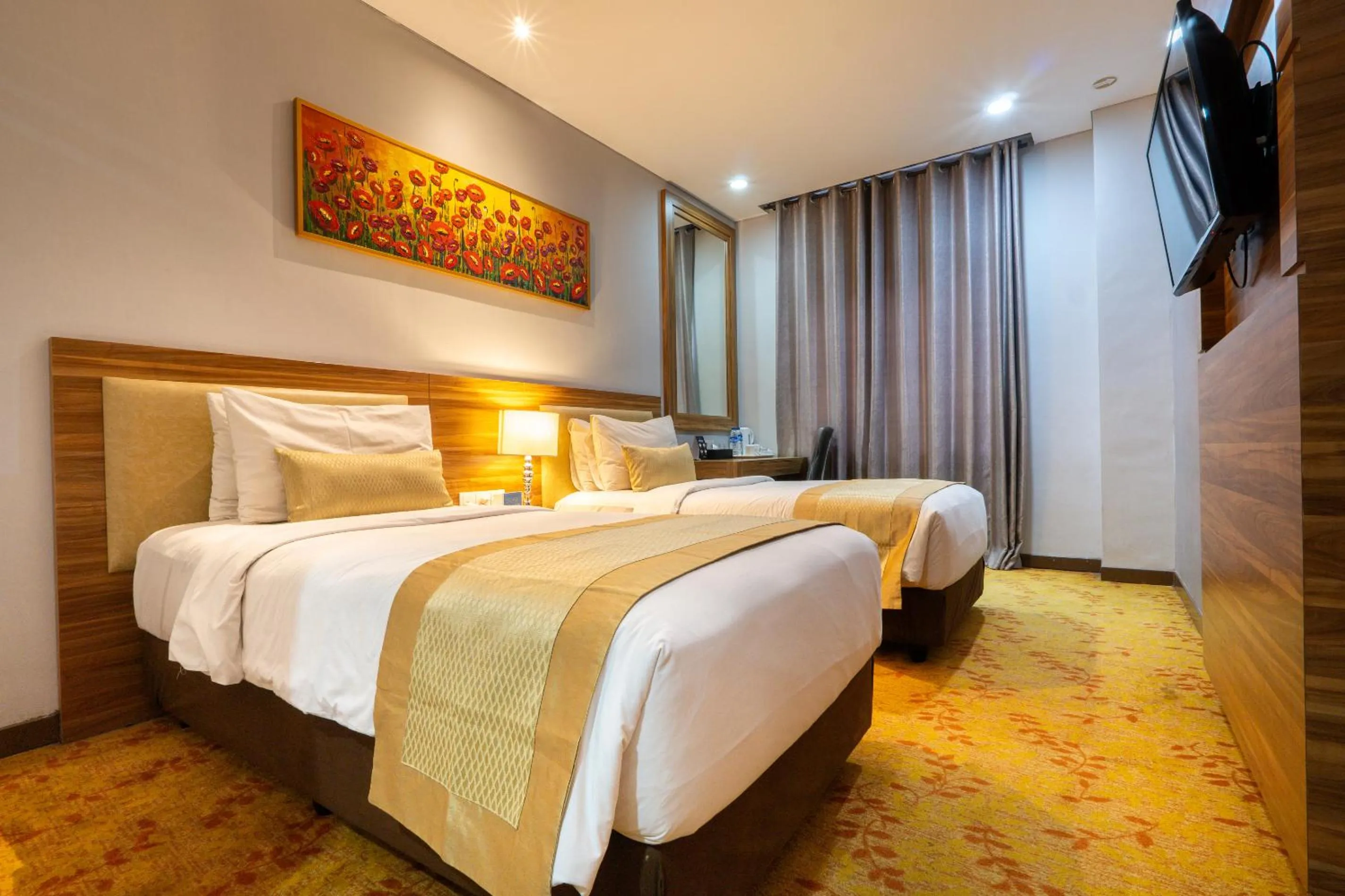 Bed in Grand Serela Yogyakarta