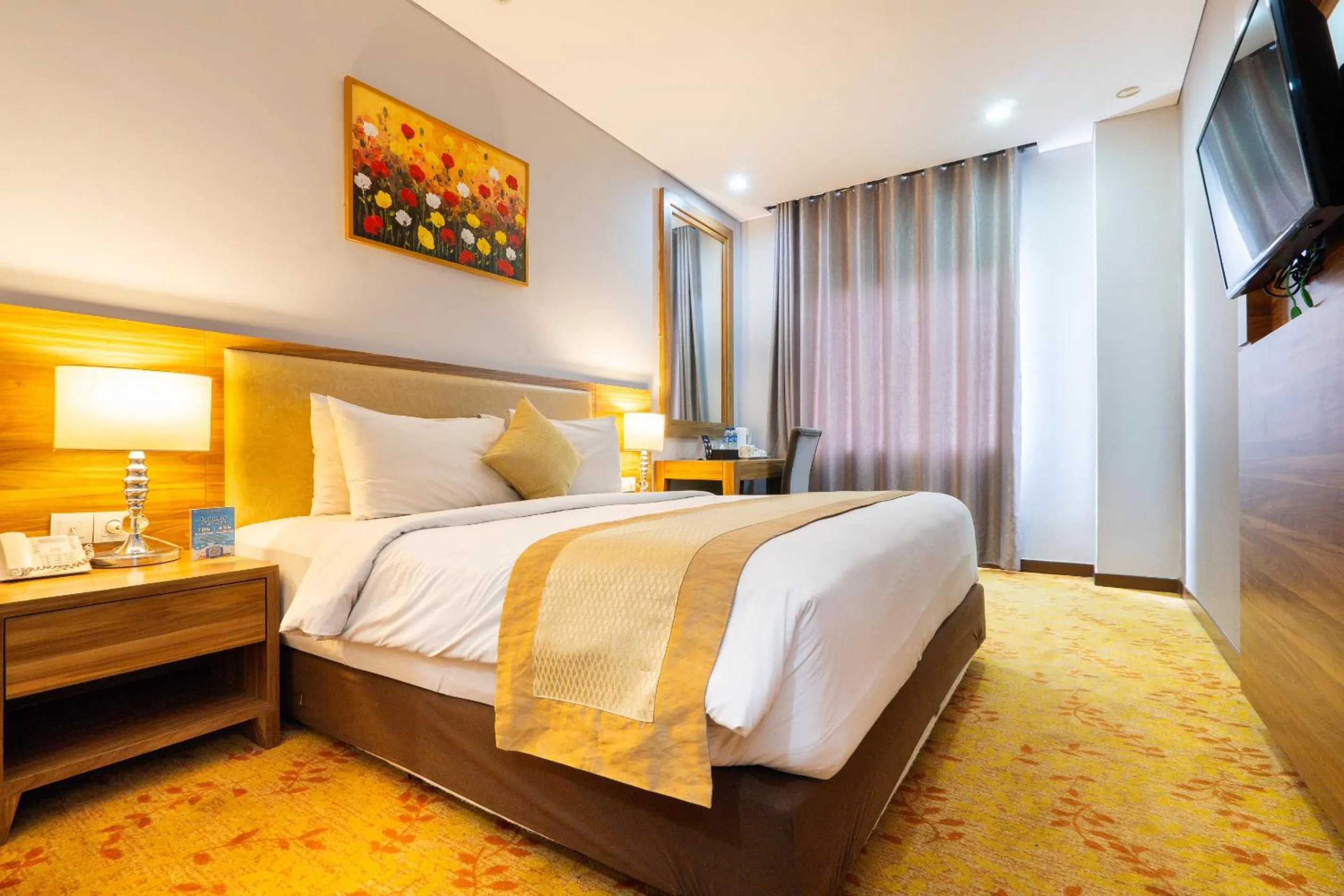 Bed in Grand Serela Yogyakarta