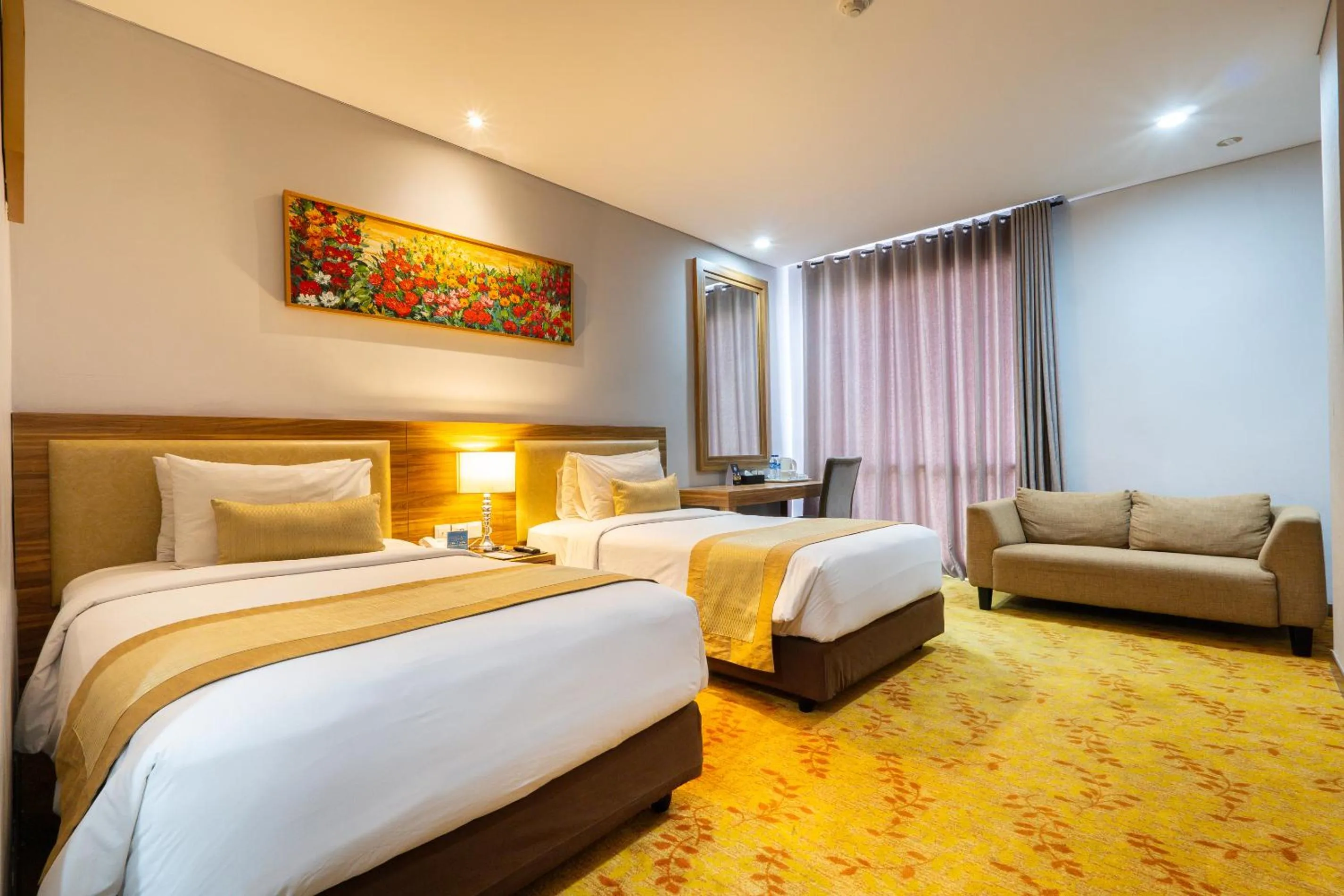 Bed in Grand Serela Yogyakarta