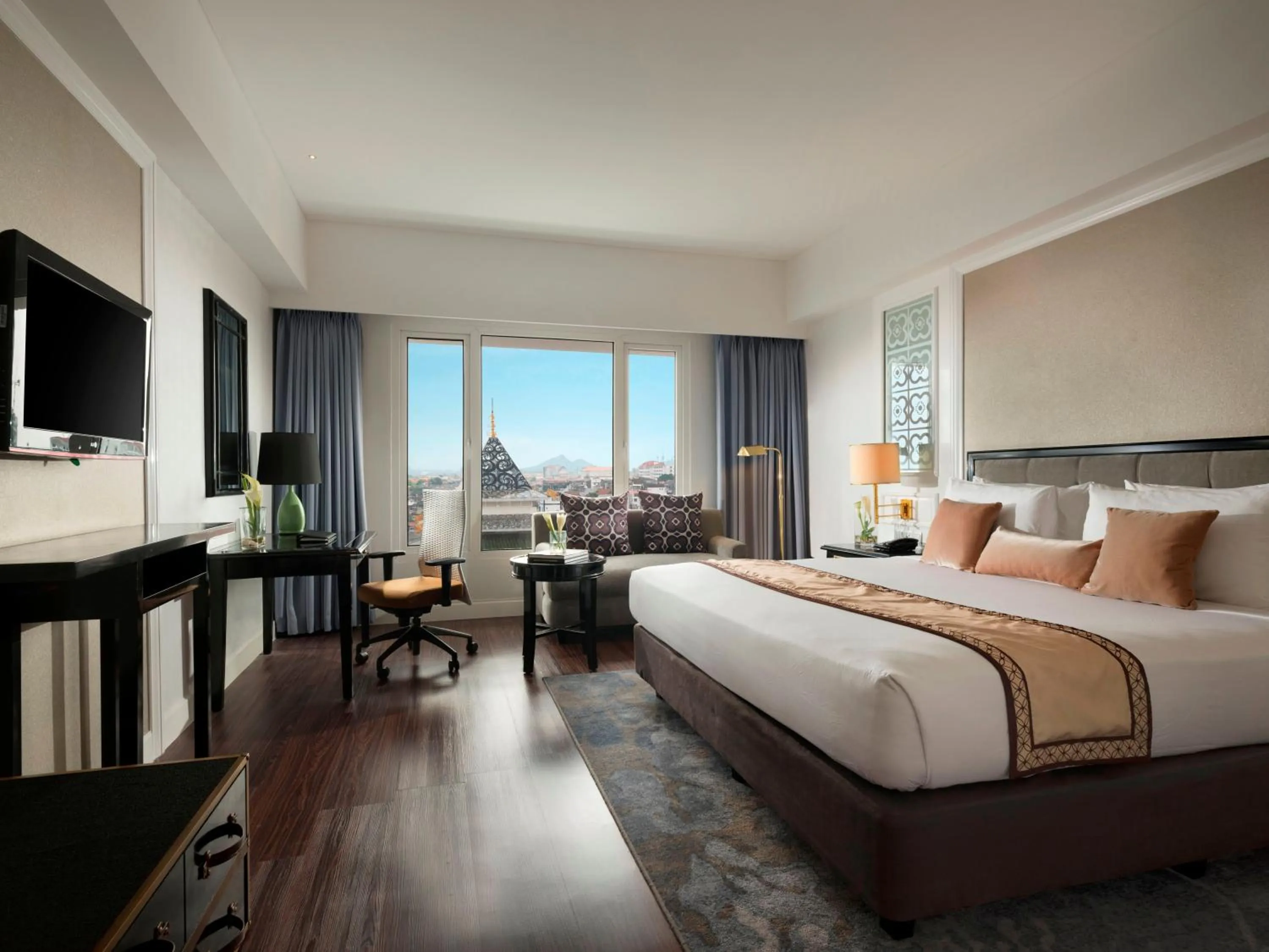 Seating area, Bed in Melia Purosani Yogyakarta