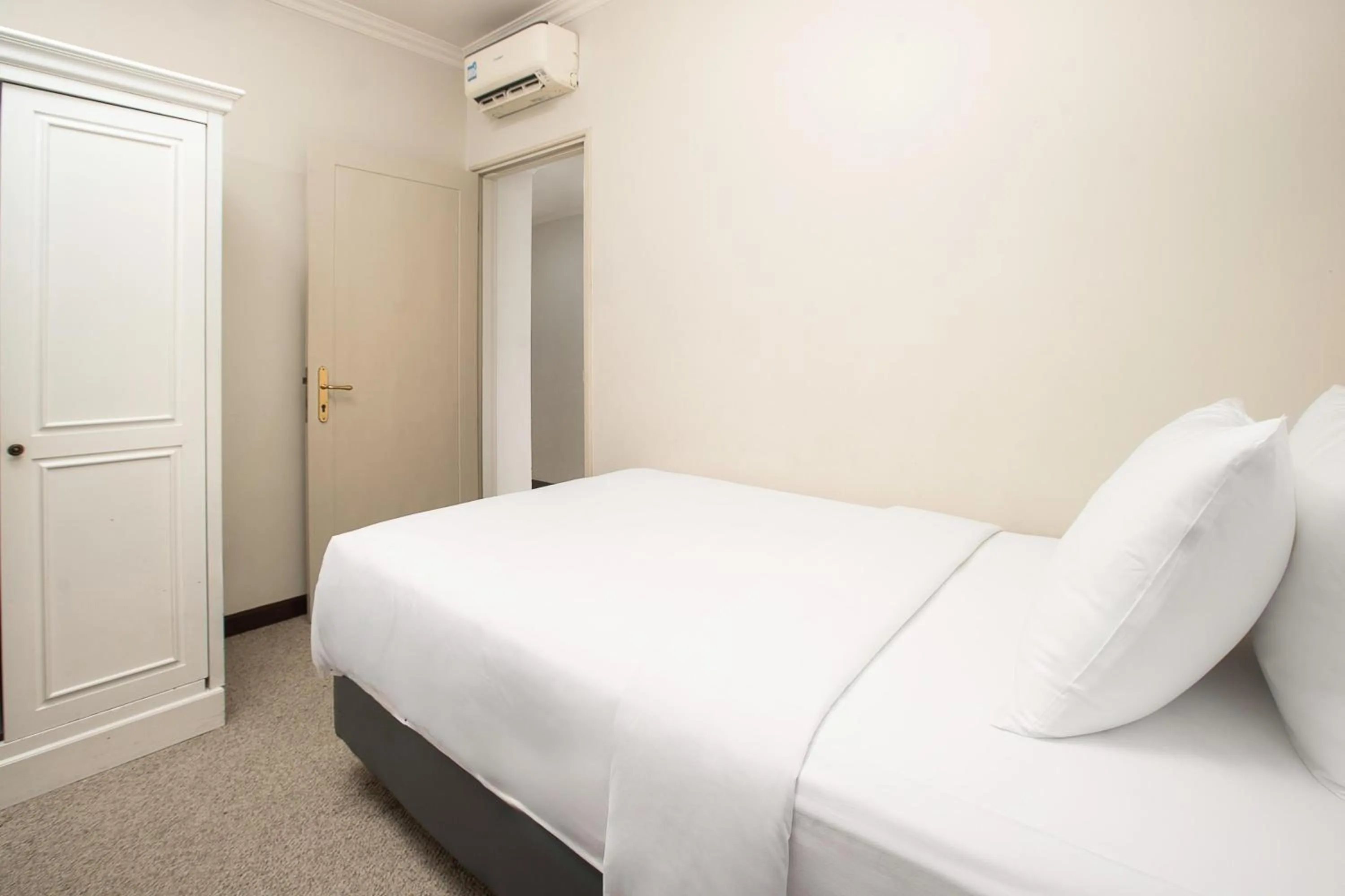 Bed in Aryaduta Suite Semanggi