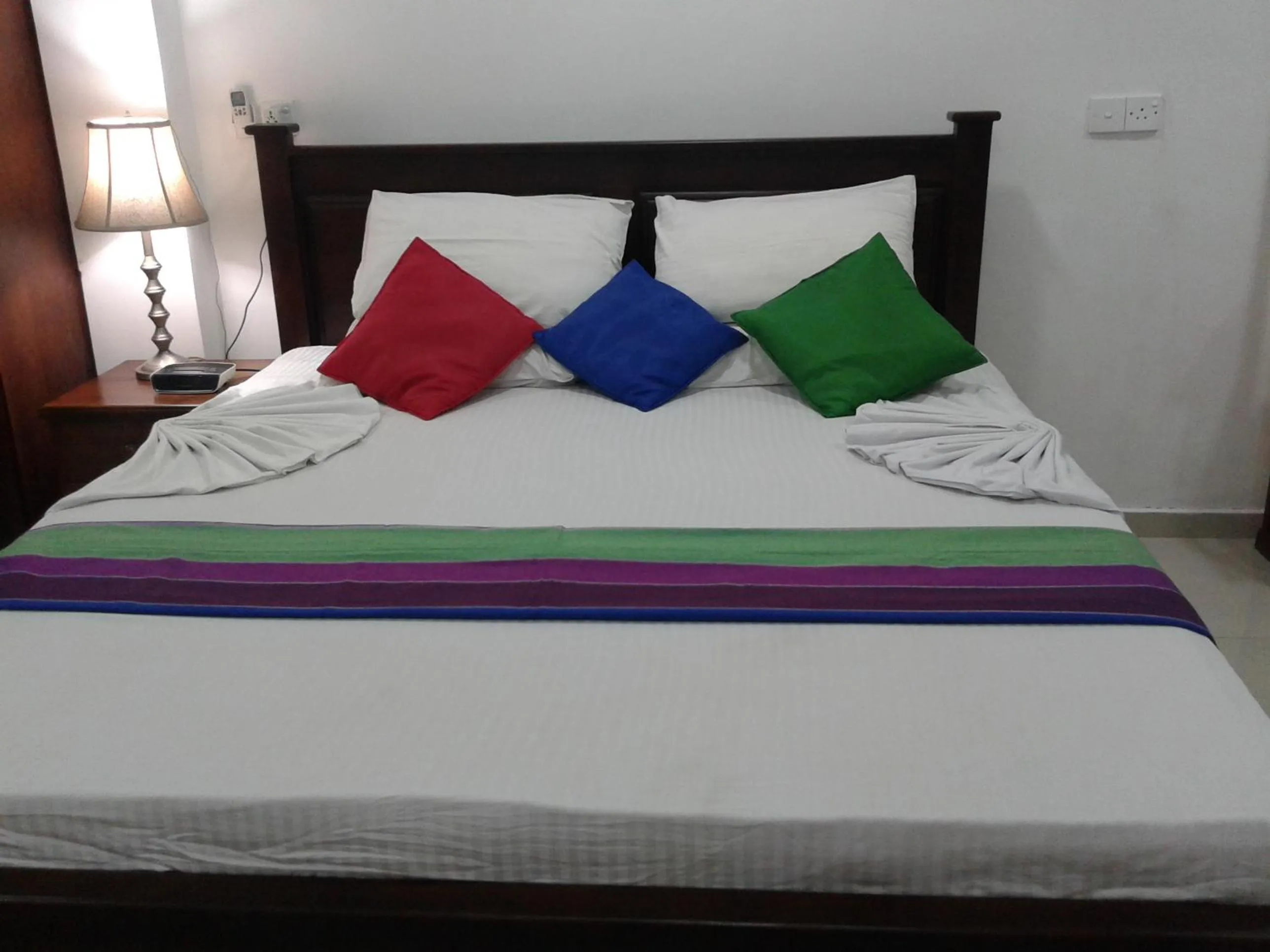 Bed in Hareesha Holiday Resort