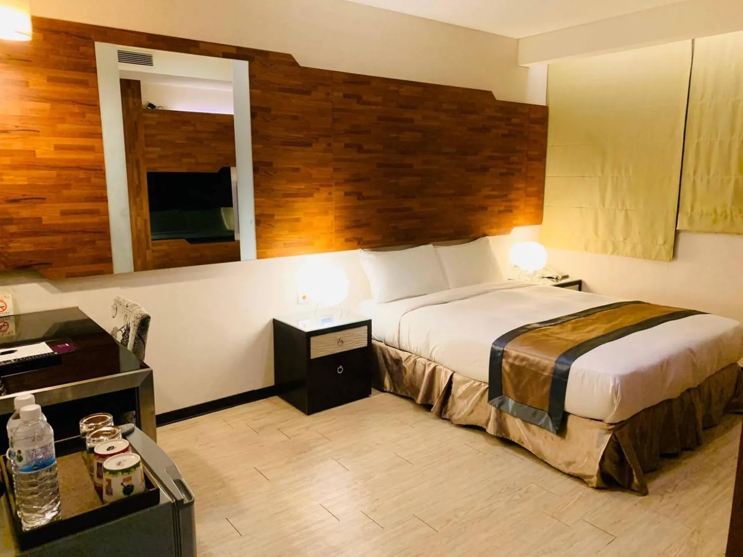 Bed in Kaishen Sinsu Hotel