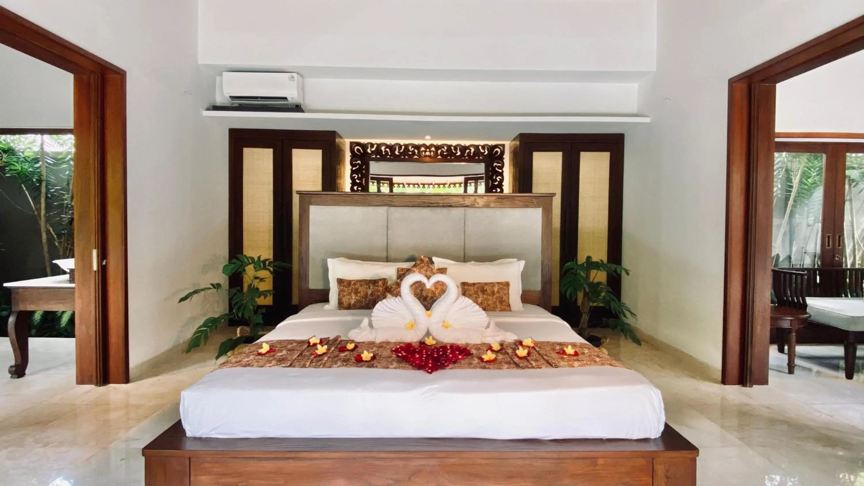 Bed in Aria Exclusive Villas & SPA