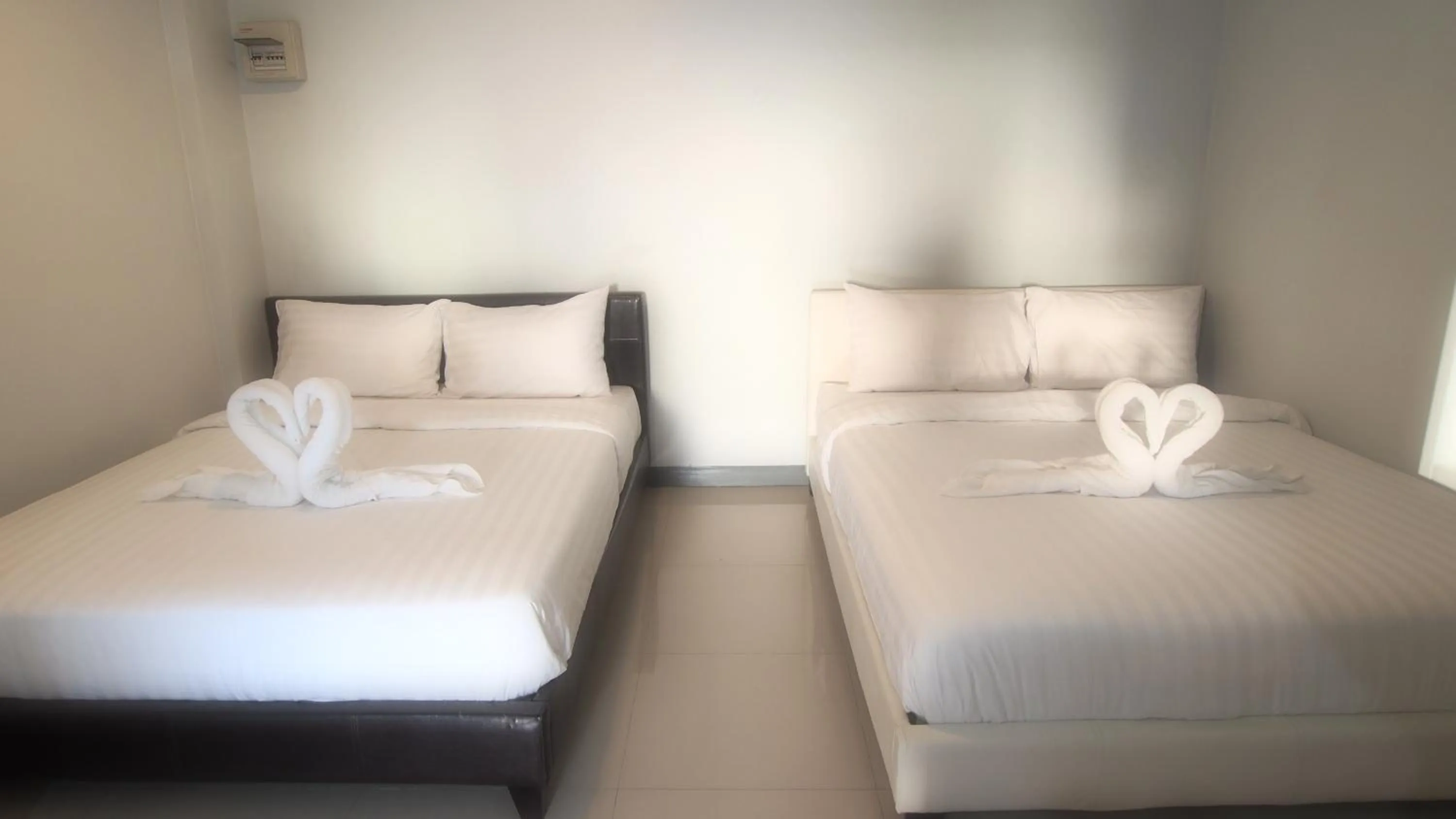 Bed in ibeyond Apartment Romklao Suvarnabhumi