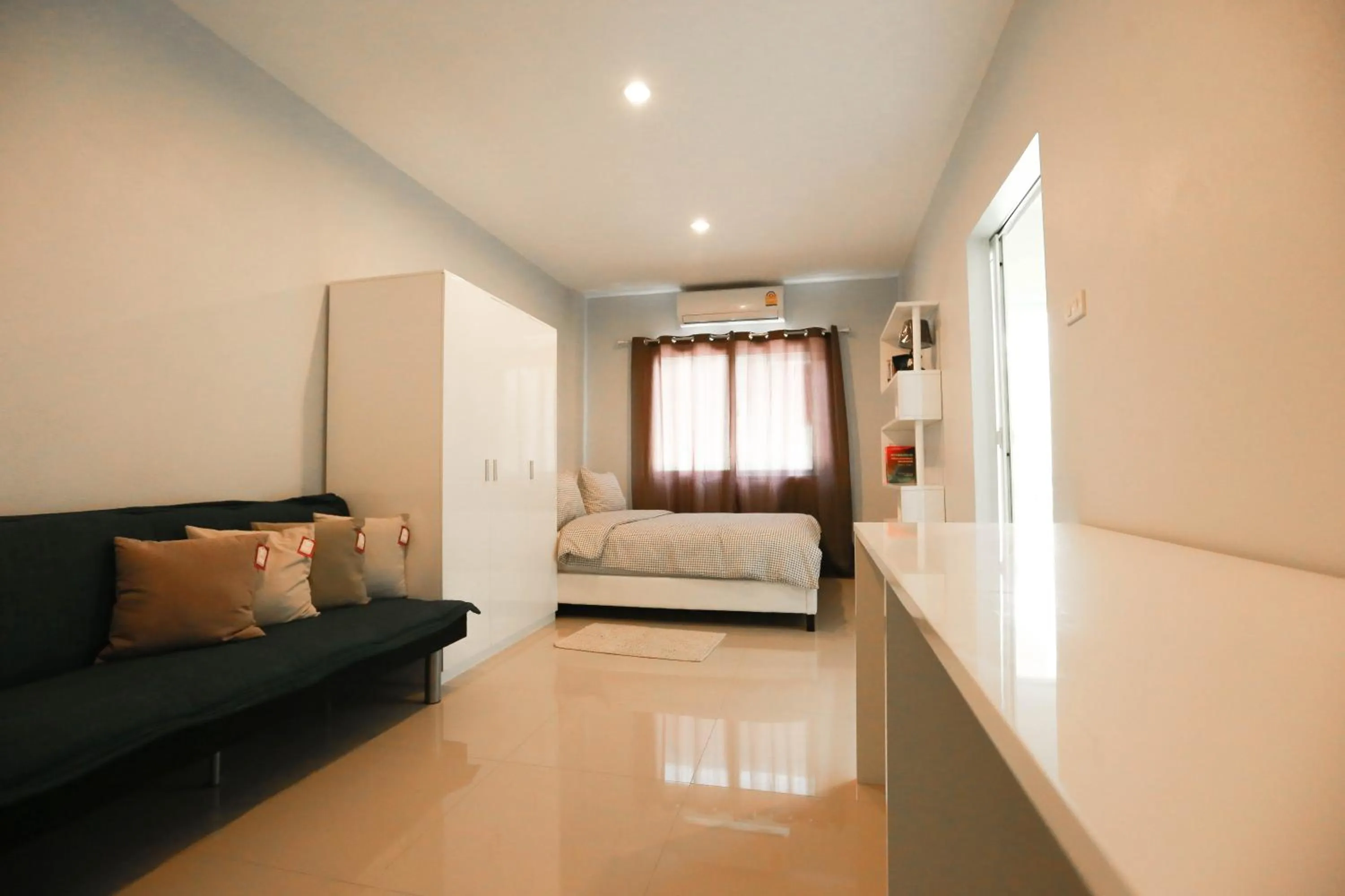 Bed in ibeyond Apartment Romklao Suvarnabhumi