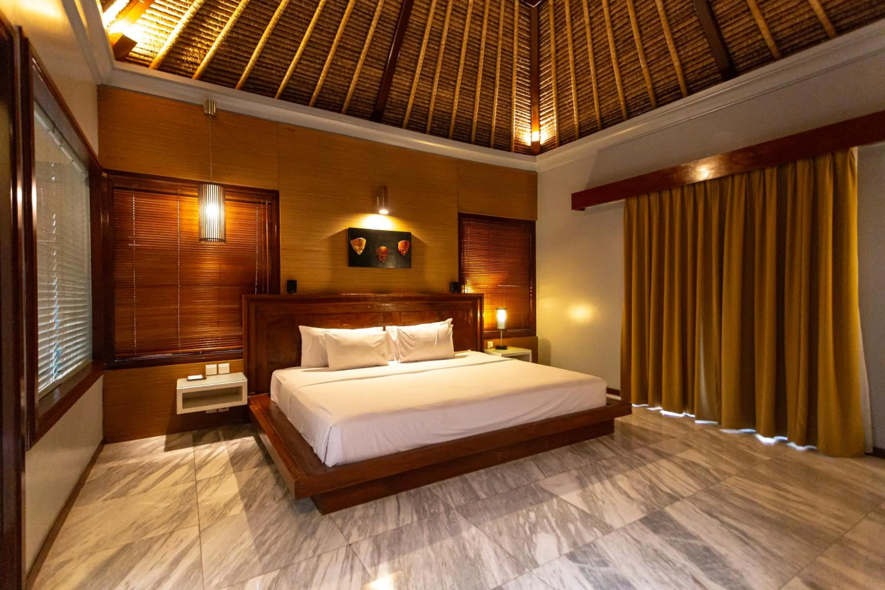 Bed in Abi Bali Resort and Villa