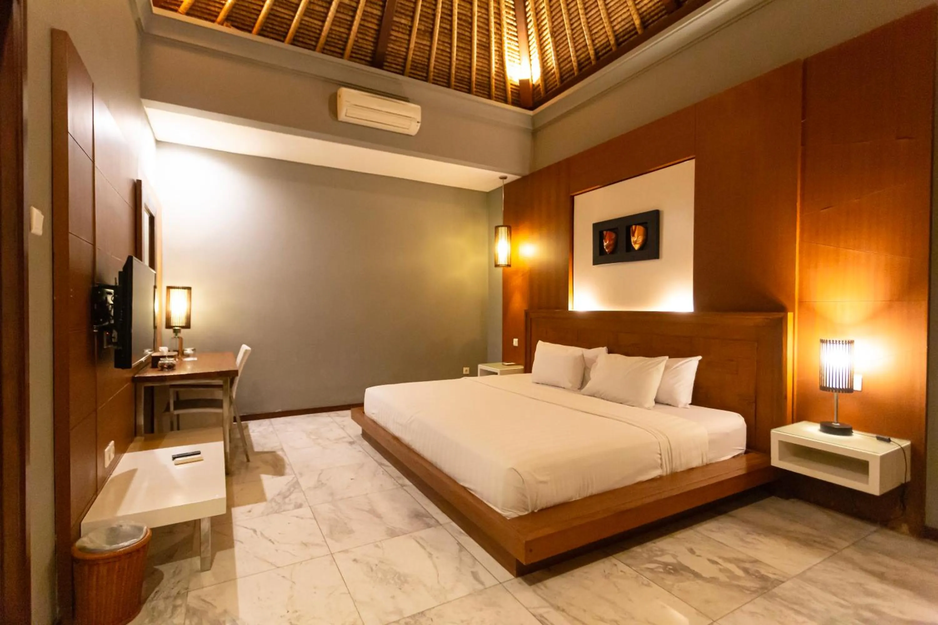 Bed in Abi Bali Resort and Villa