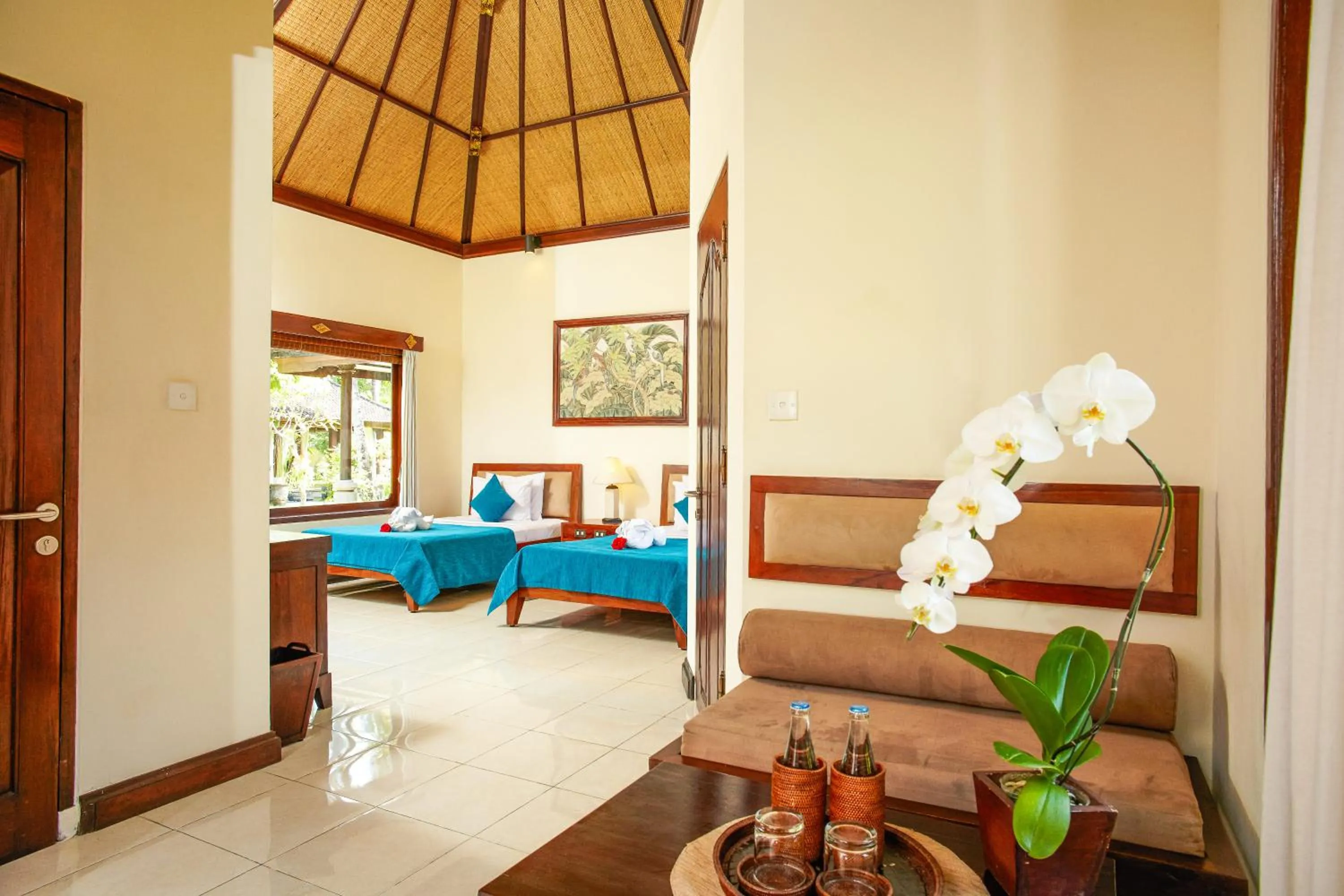 Living room, Bed in Puri Bagus Candidasa