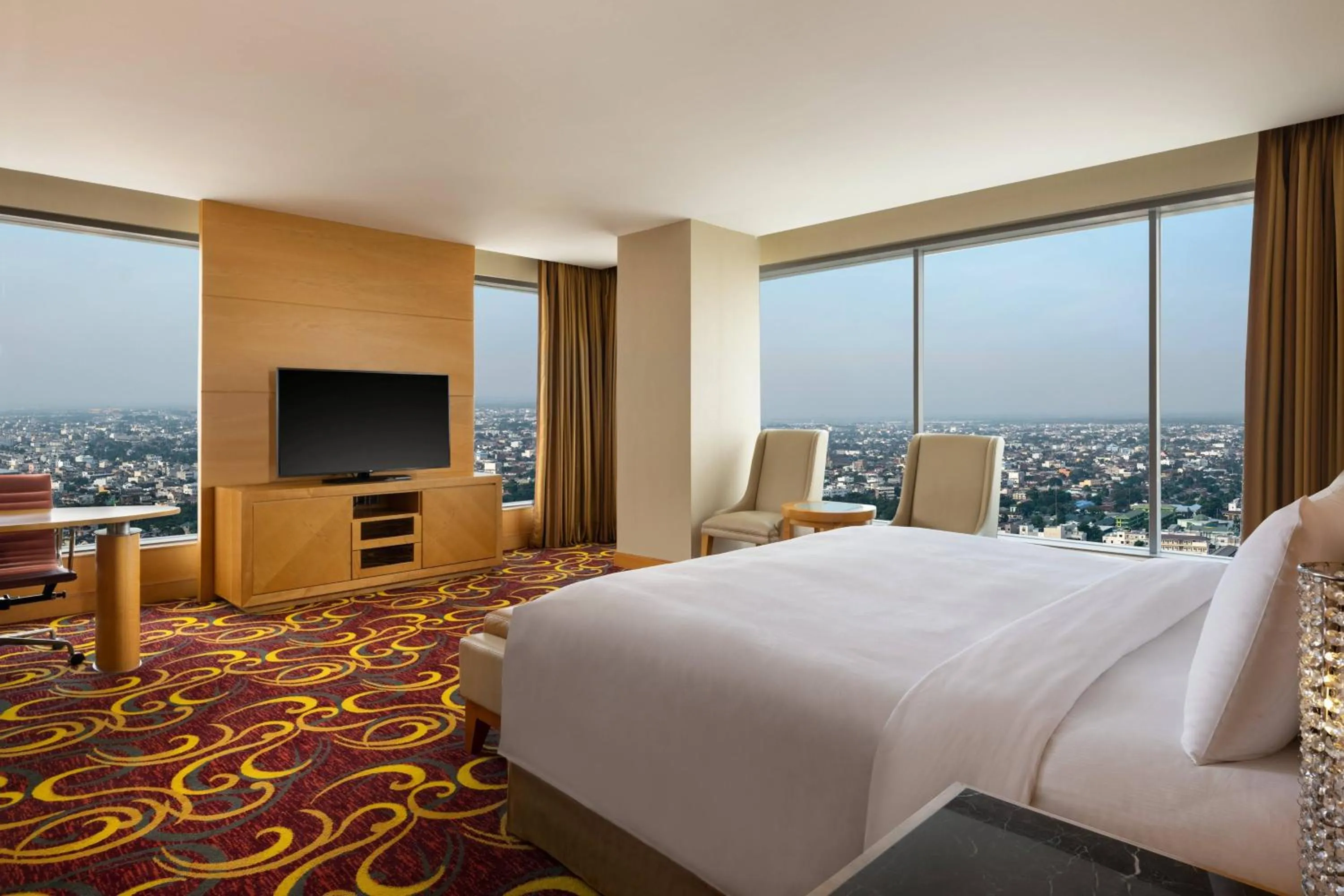Photo of the whole room, Bed in JW Marriott Hotel Medan