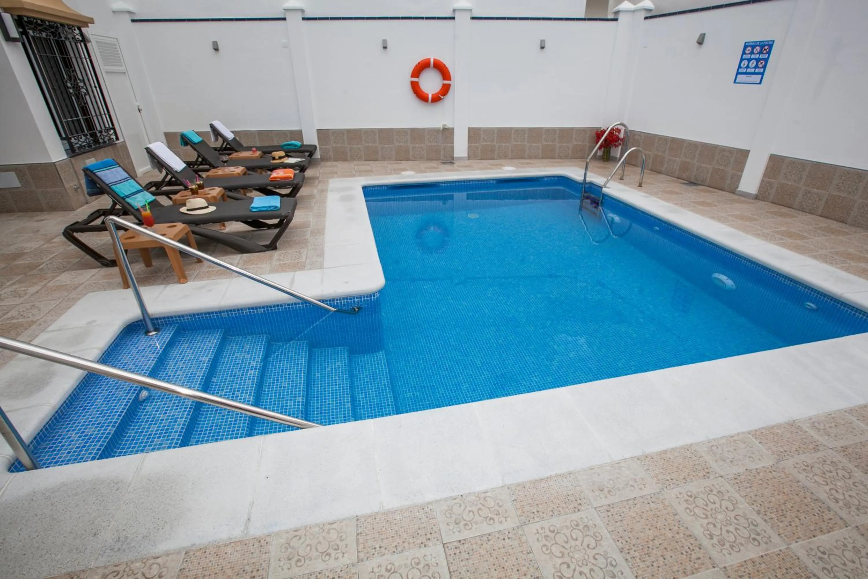 Swimming pool in Hostal Boutique Bajamar