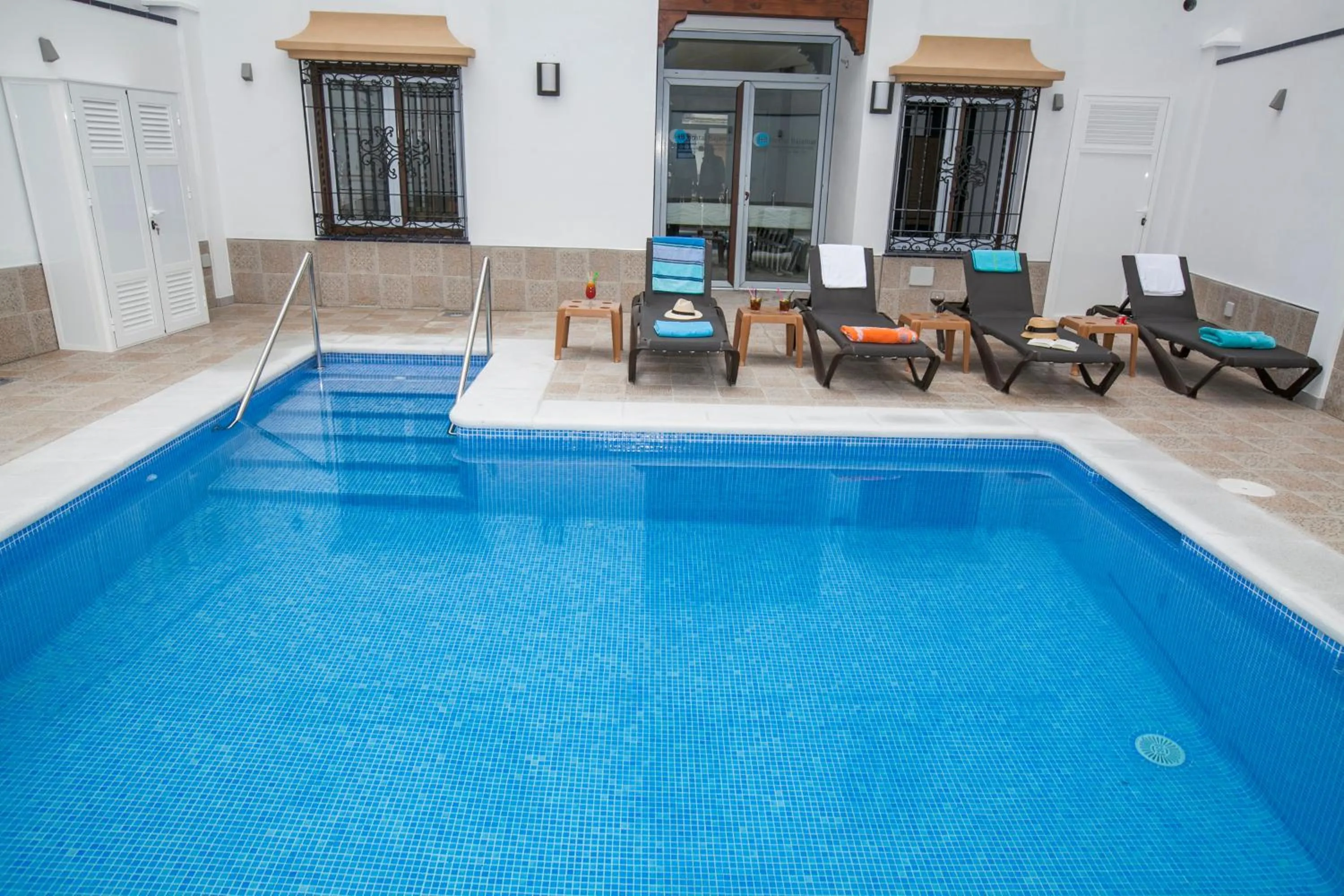 Swimming pool in Hostal Boutique Bajamar