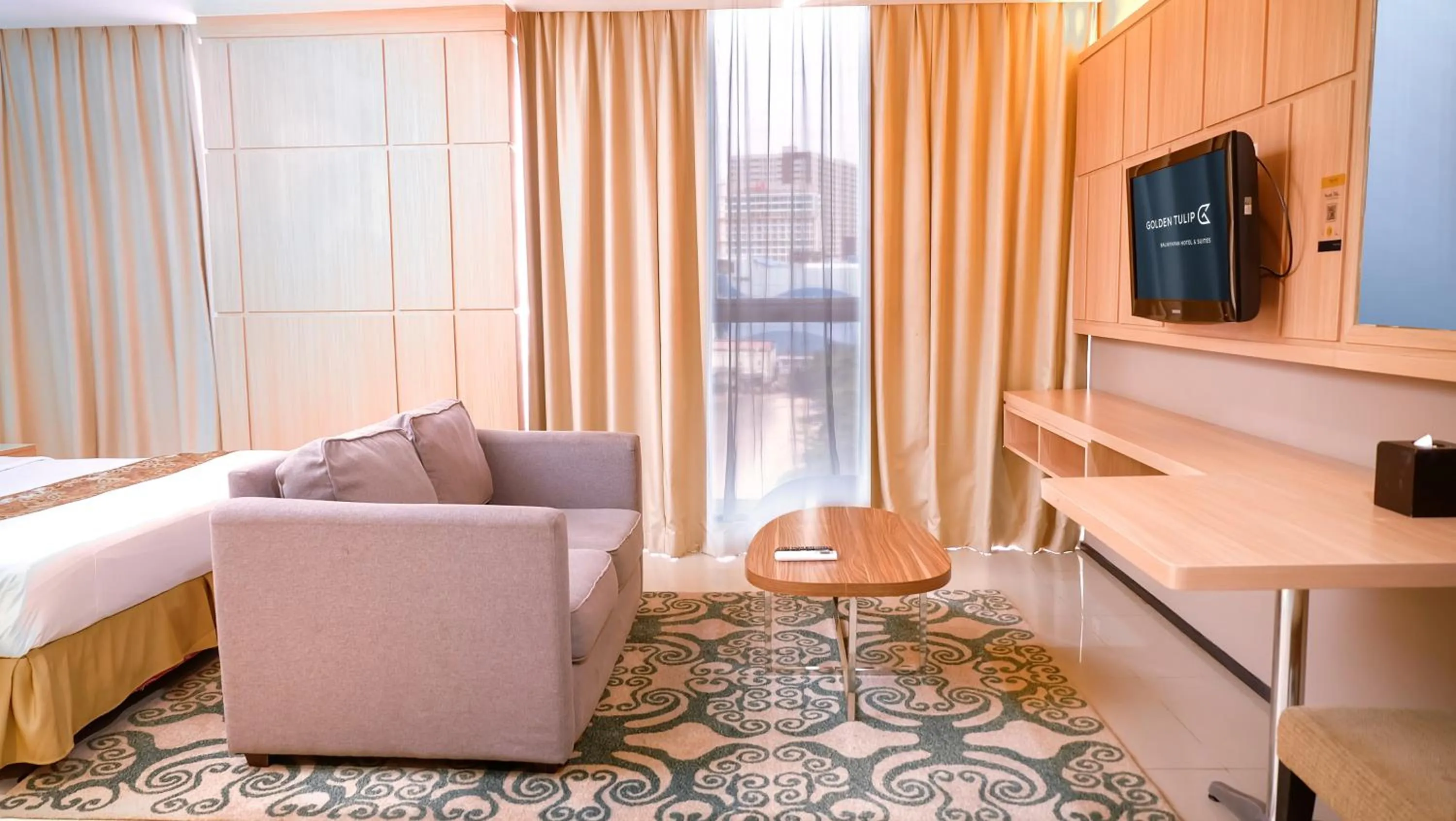 Living room in Golden Tulip Balikpapan Hotel & Suites