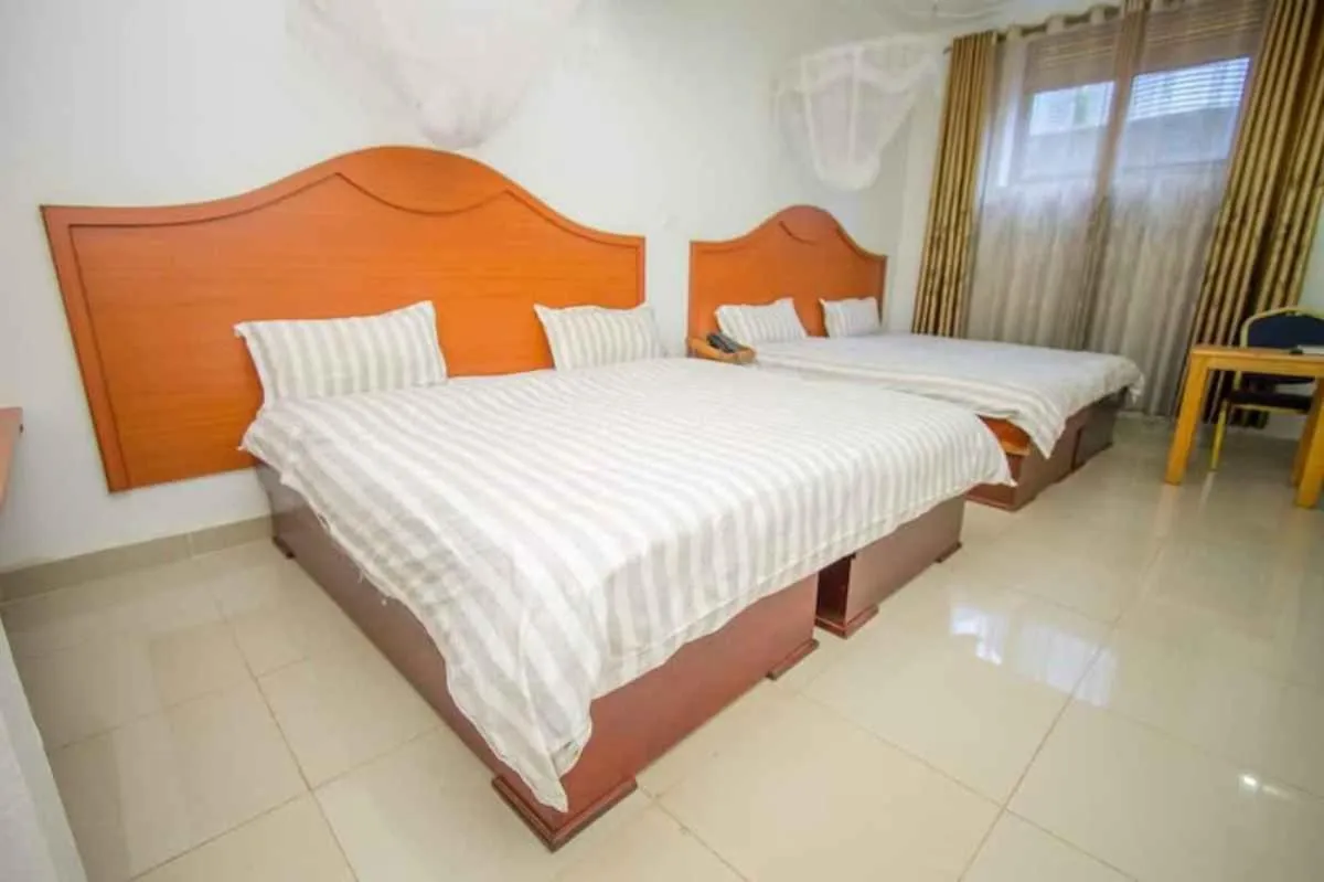 Bed in Zebra Hotel Masaka
