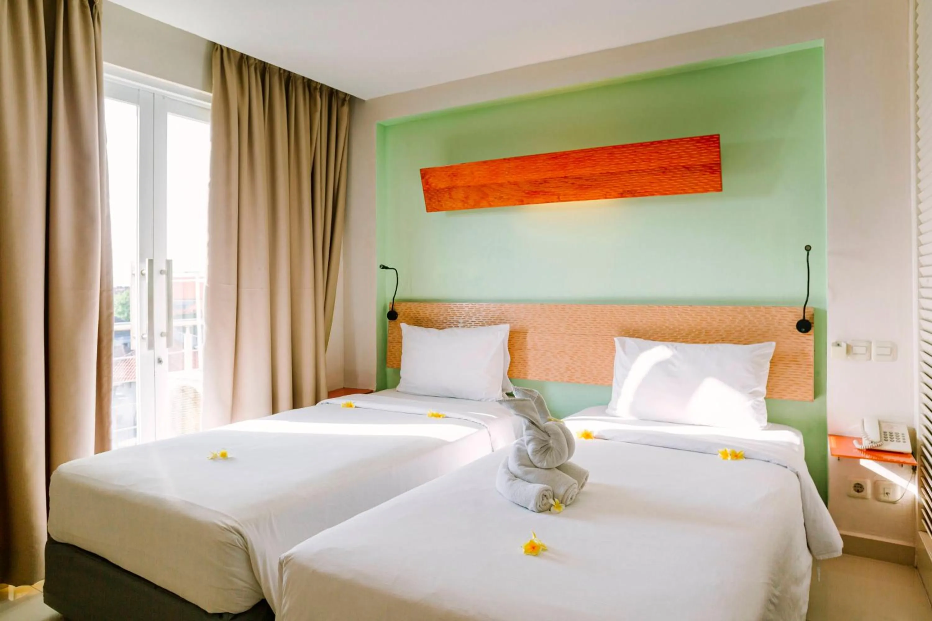 Bed in HARRIS Hotel & Residences Riverview Kuta, Bali