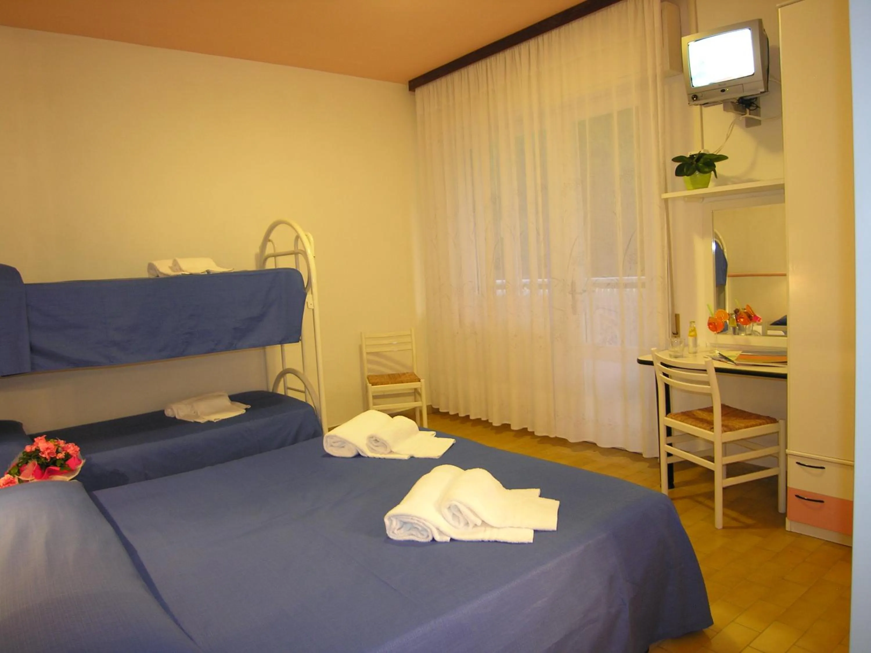 Bed in Hotel Garni Tahiti